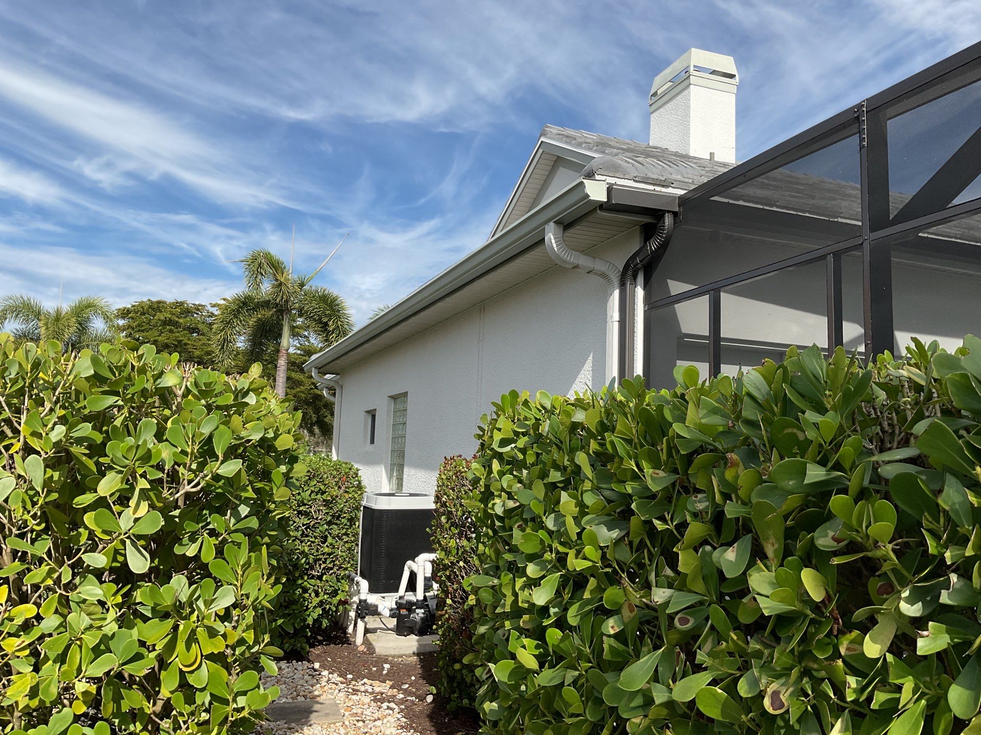 7-inch Grey Gutter Installation and White Downspouts in Fort Myers FL  by Gutter Professors