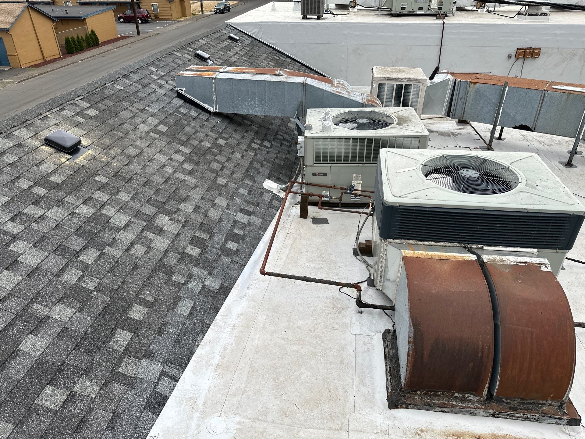 Summit Grey Lum Yun Salem Oregon Commercial Roof by Orezona Building & Roofing Company, Inc.