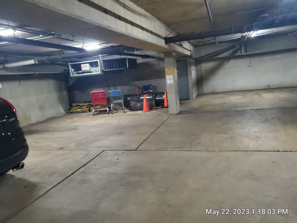 Parking garage using Hot water by Northern Power Washing LLC.