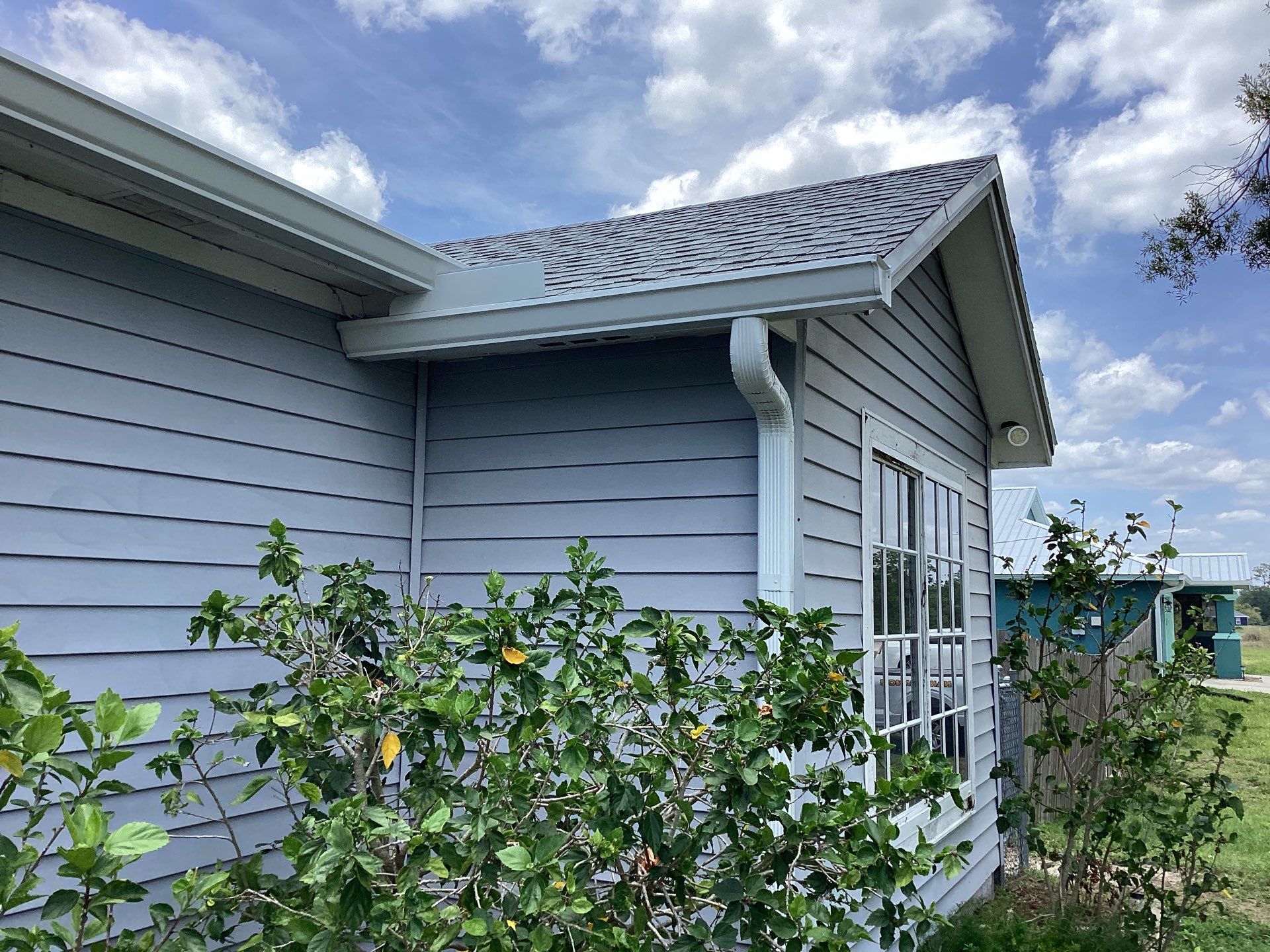 Aluminum Seamless Gutters using Splash Guard in Cape Coral FL by Gutter Professors