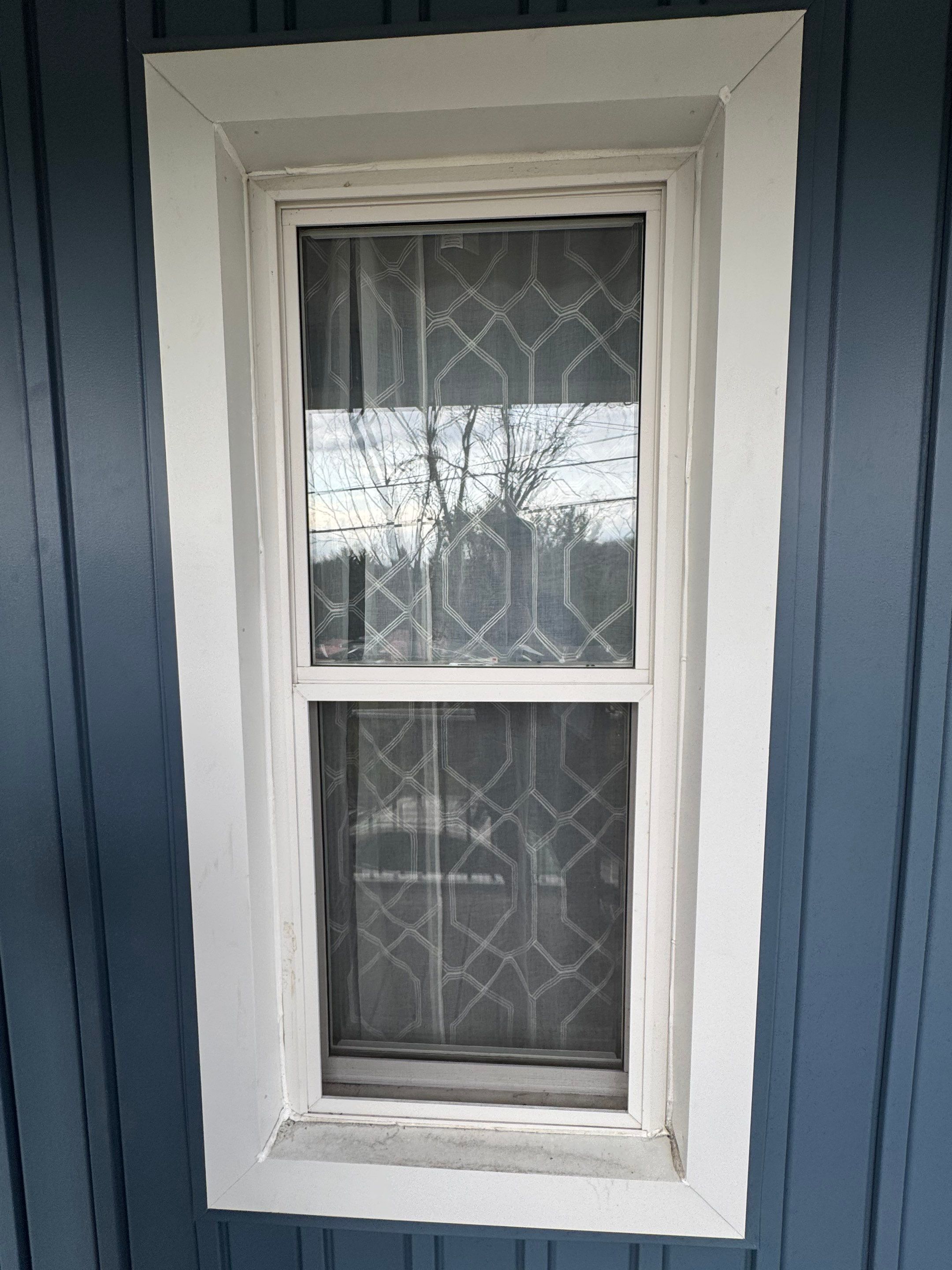 White Frame Window Replacement for St Clairsville Board-and-Batten Exterior by Ohio State Windows