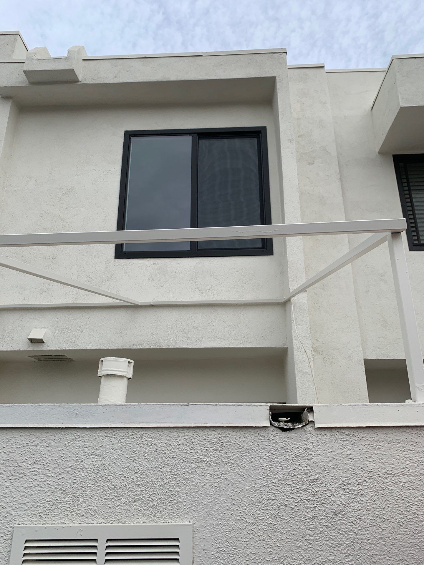 Window Installation using AMSCO Black Vinyl Windows by American Window Company