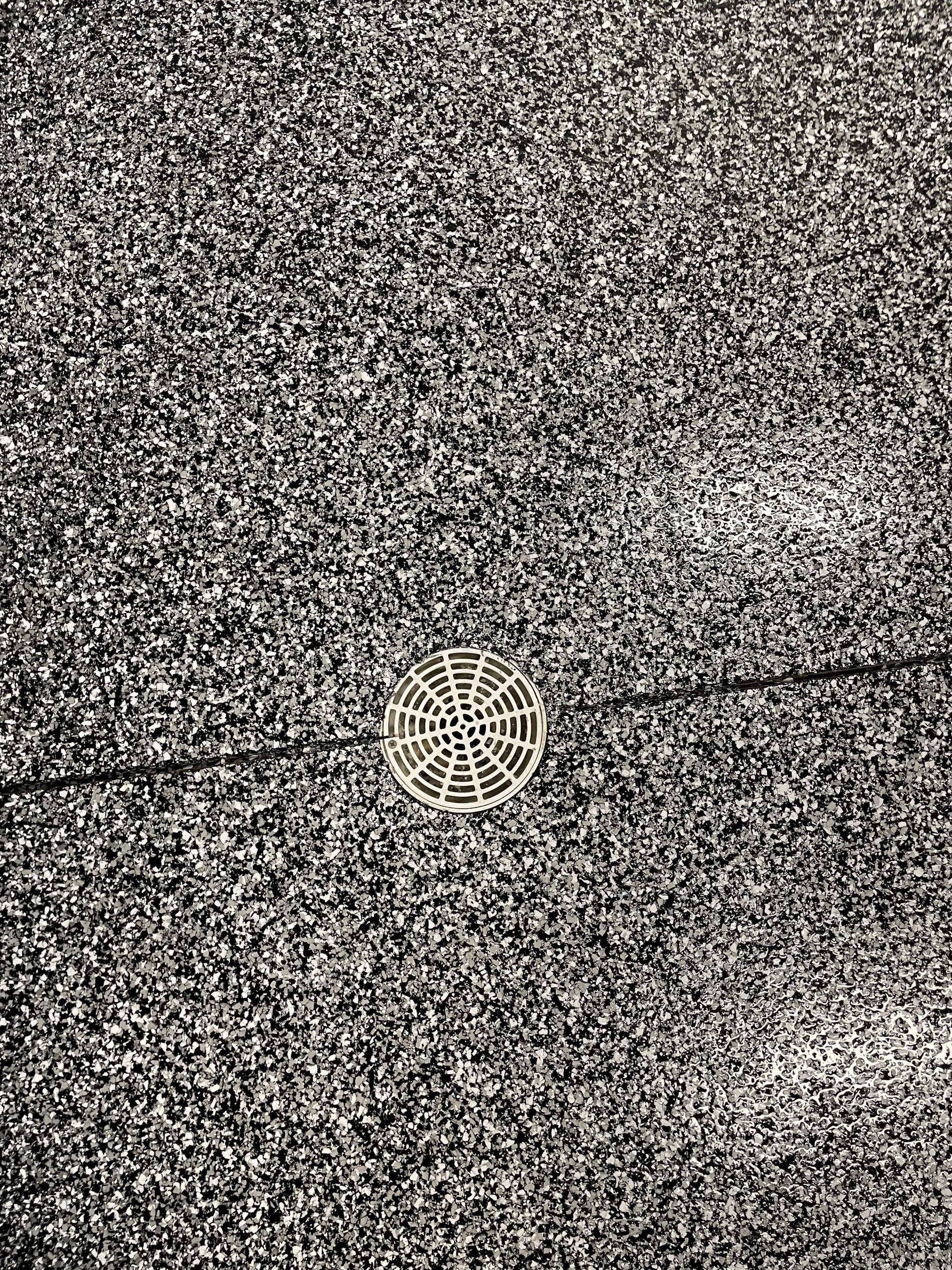 Garage Floor Coating and Domino Flake Finish in Sioux Falls by Select Painting, Coatings & Garage Cabinets