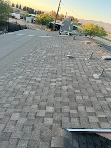 Nick & Rhonda's Full Re-Roof by All Storm Roofing & Construction