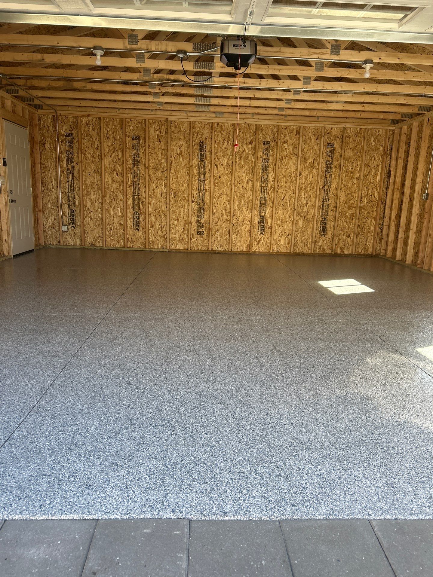 Bring Revival To Your Detached Garage  by Revival Concrete Coatings