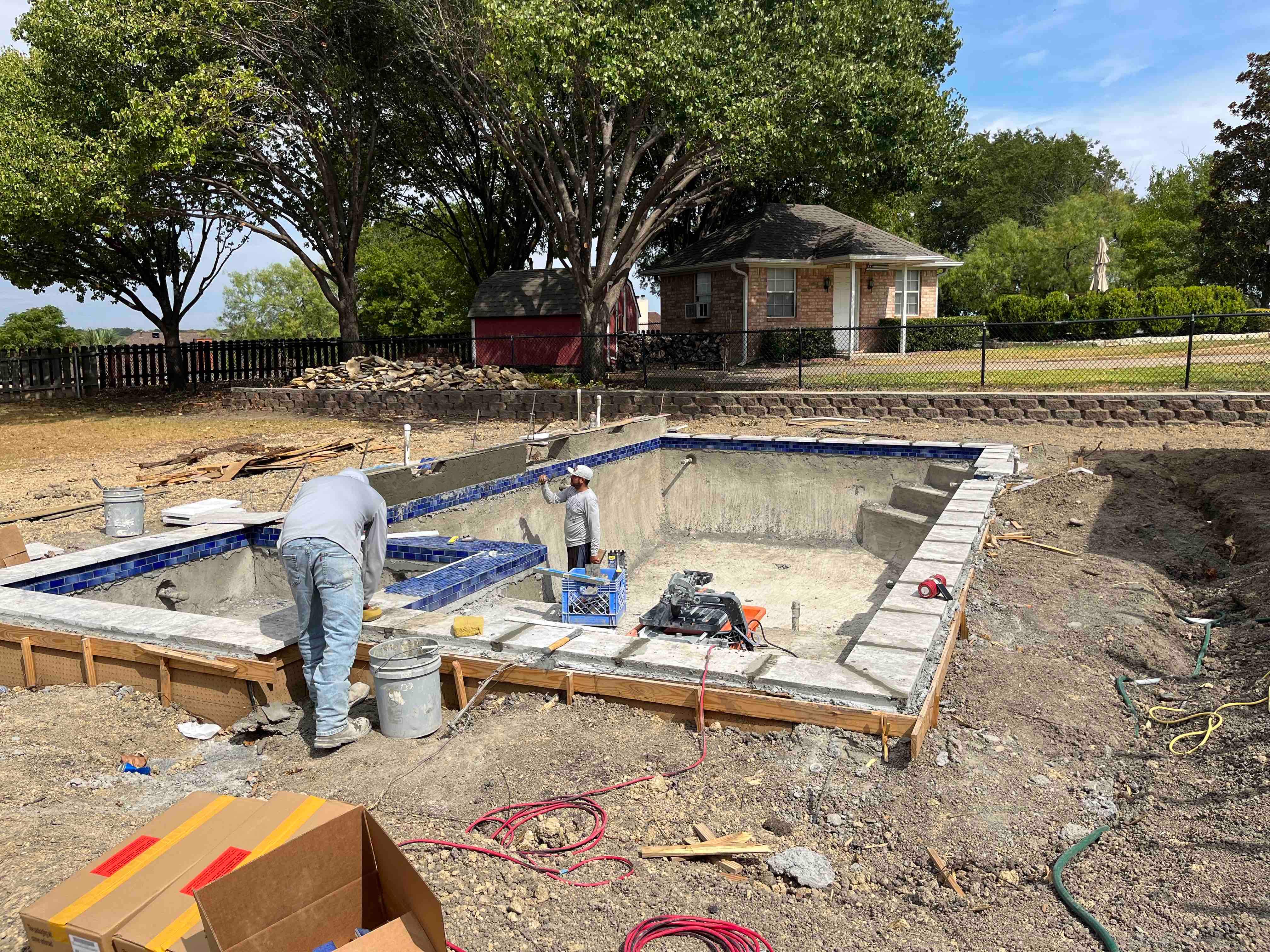 Geometric Pool with Raised Spa and Slide by Pinnacle Pools and Spas - DFW