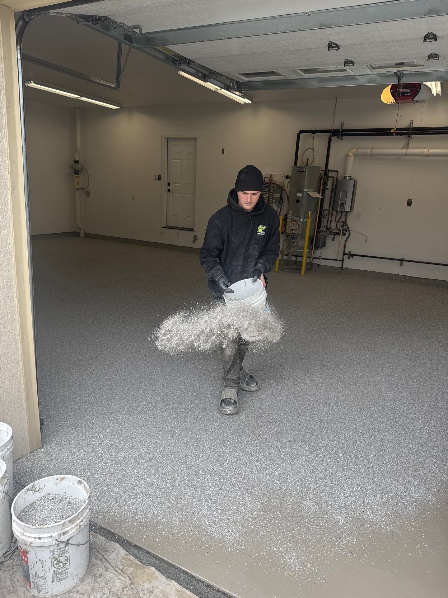 Travertine Hybrid Garage Floor Coating and Crack Repair in Spokane by Croc Coatings, LLC