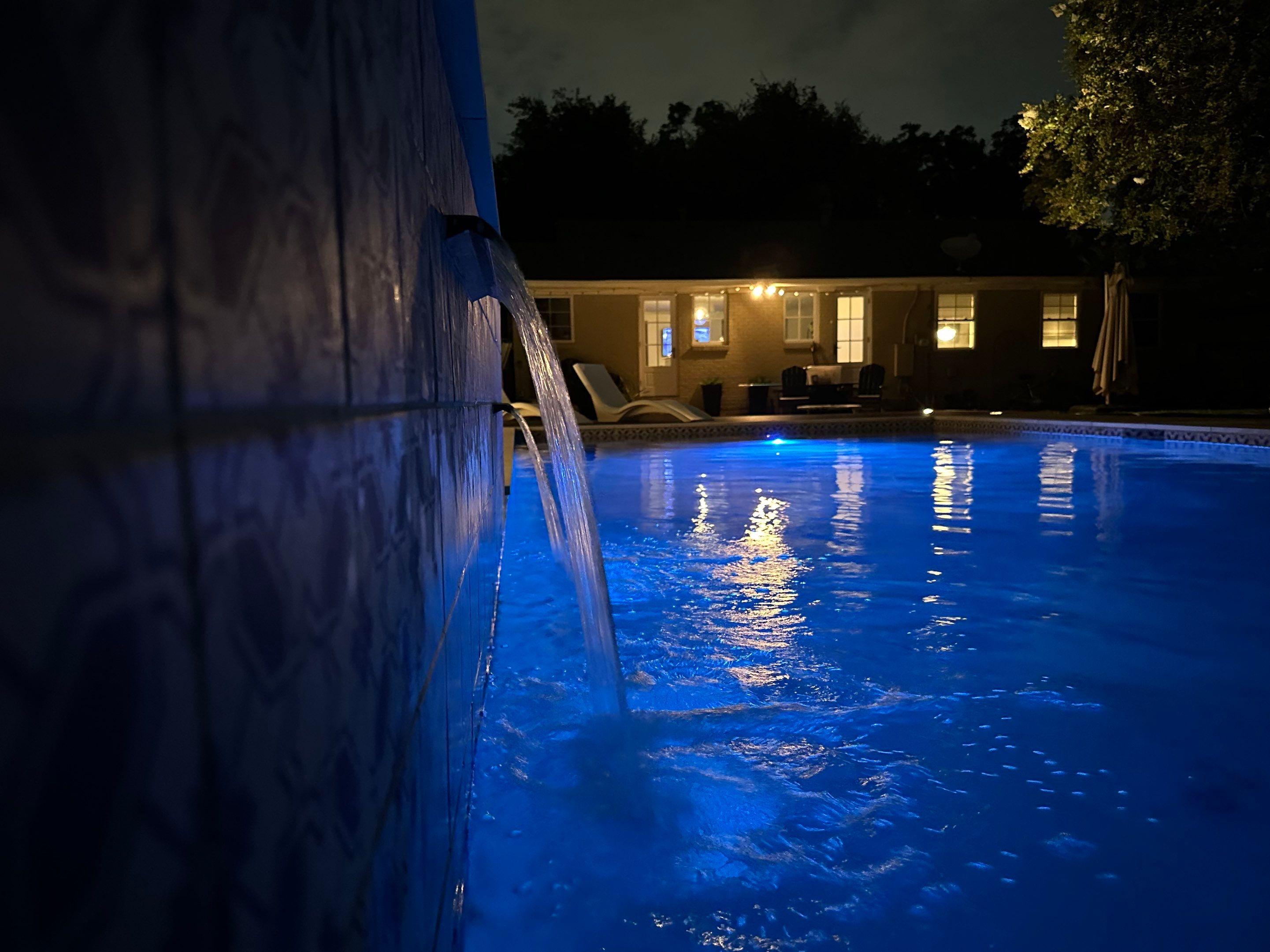 Modern Plunge Pool with Tiled Sheer-Descent Water Wall by Pinnacle Pools and Spas - DFW