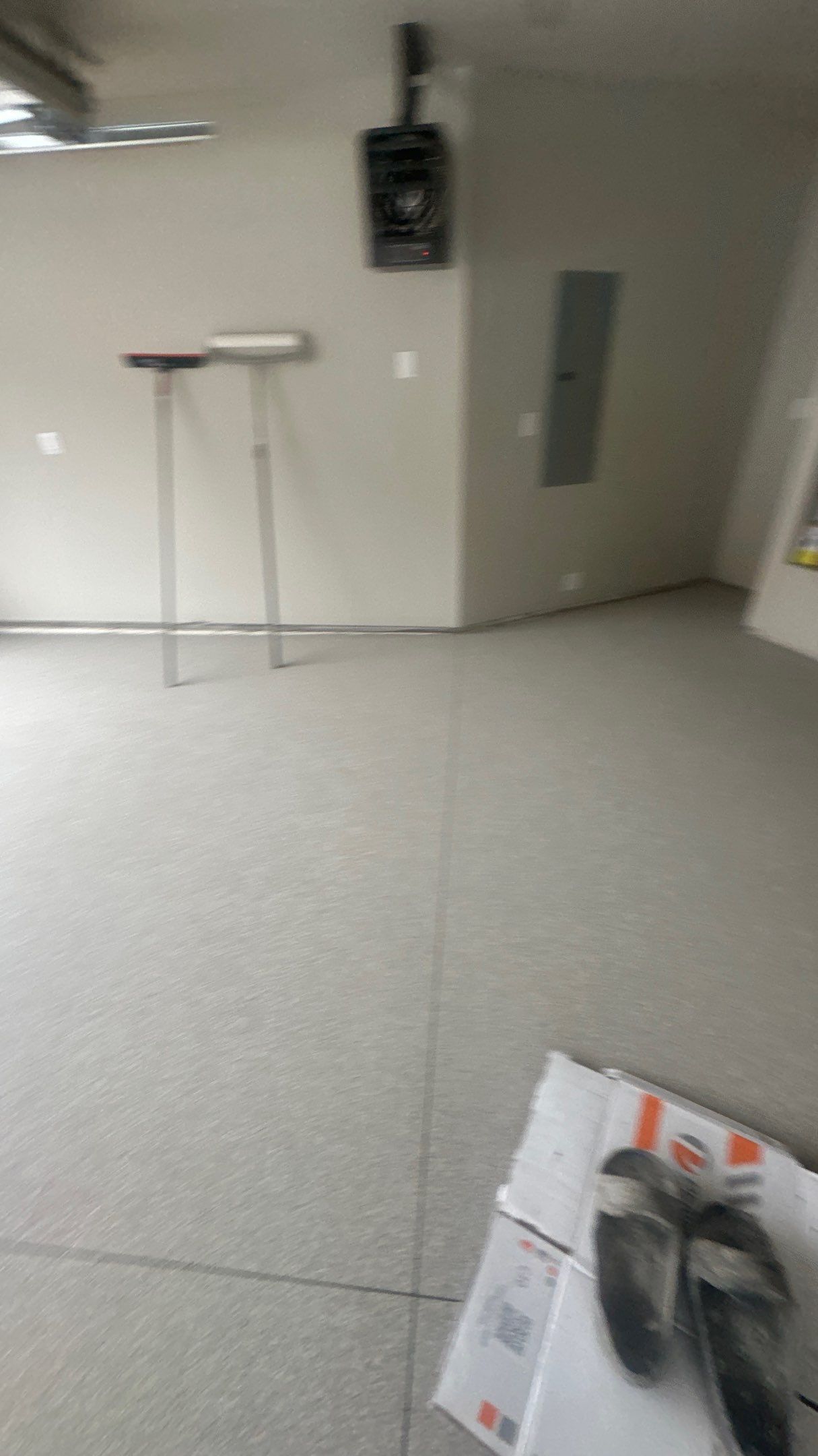 Garage Transformation using Stone/Marble Hybrid by Croc Coatings, LLC