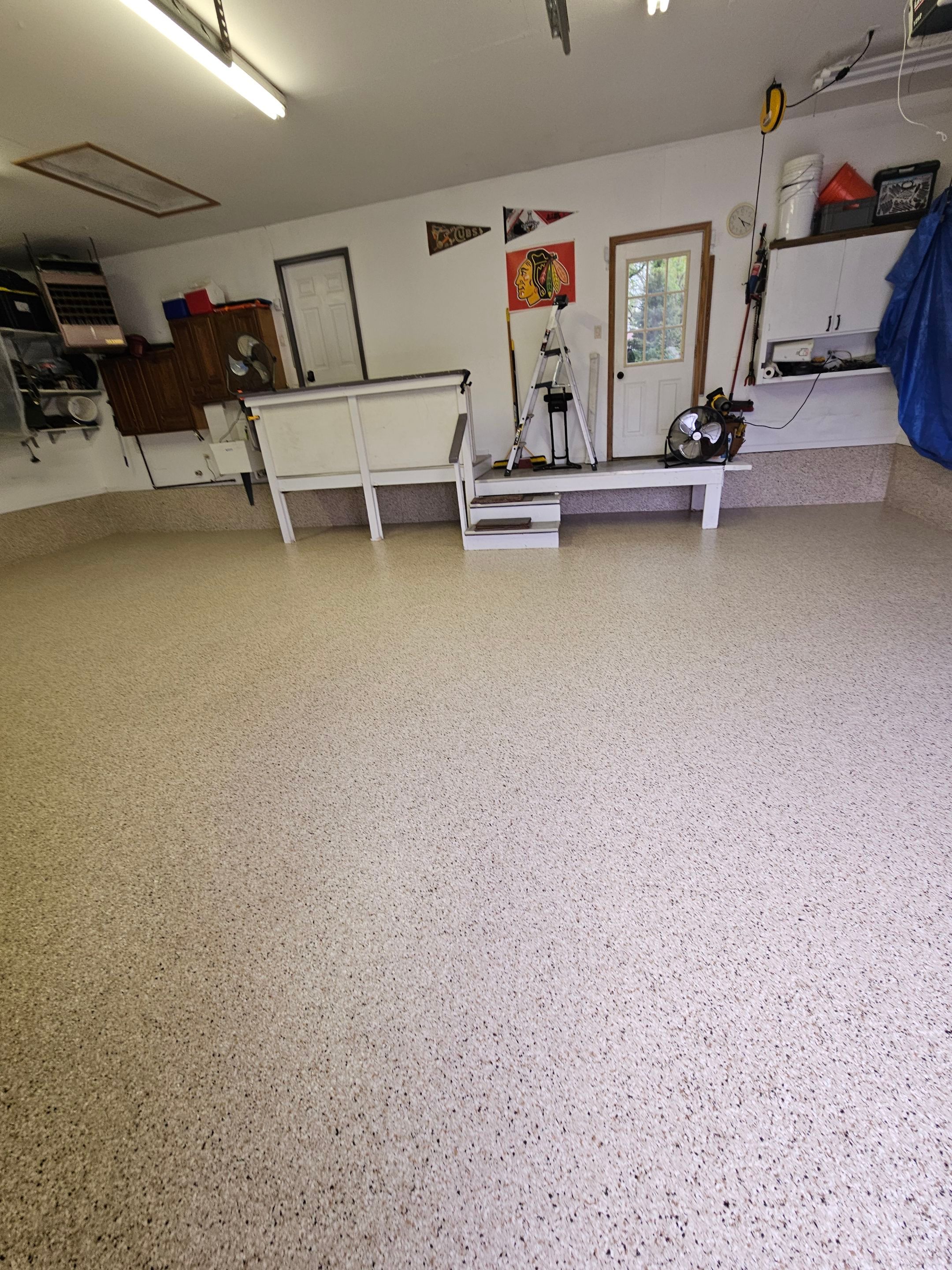 Shoreline Flake Garage Floor  by Level 10 Coatings
