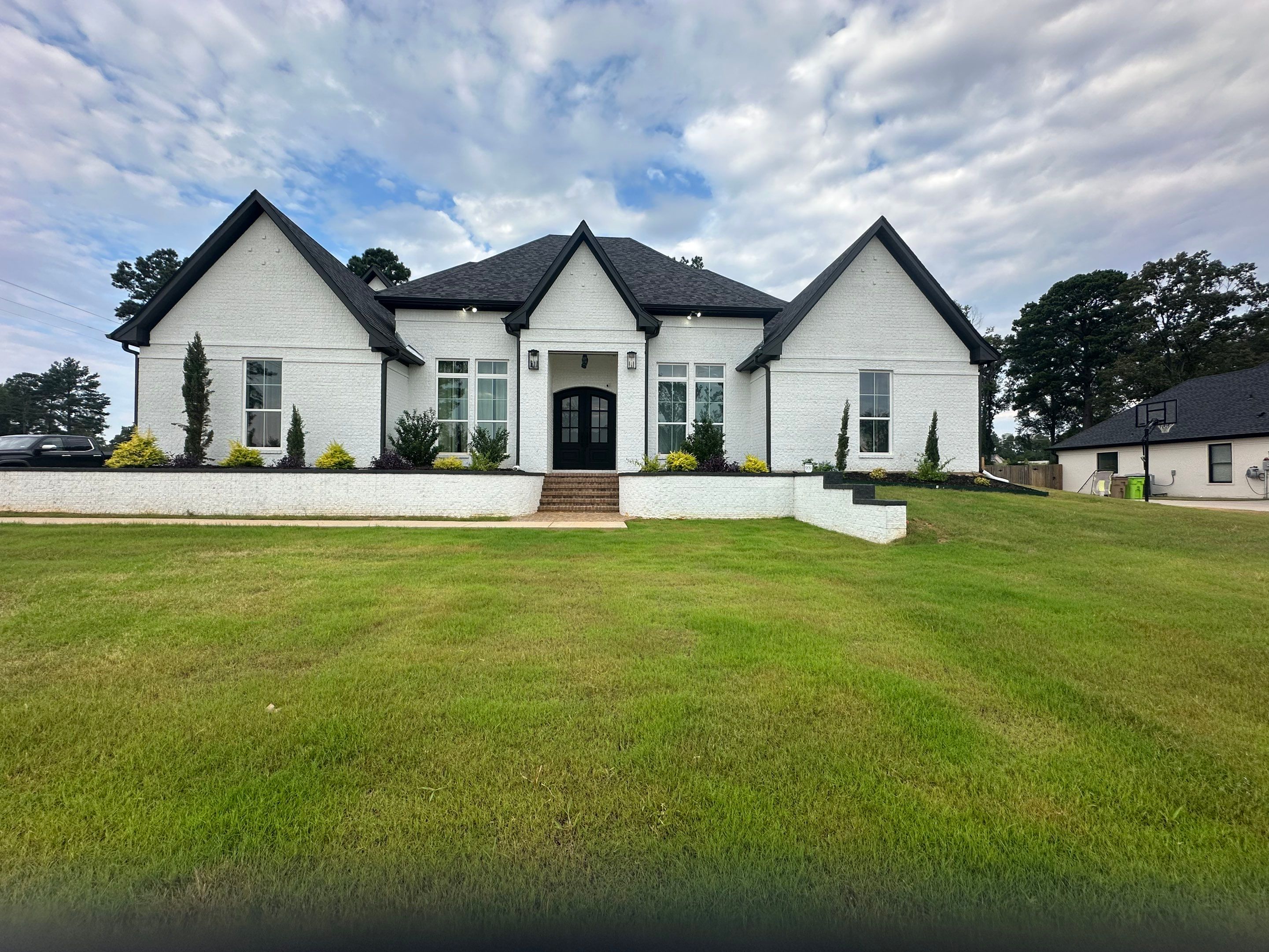 Exterior Painting in Longview, TX | Roof & Eaves in Elegant Black by Quality Coats Painting