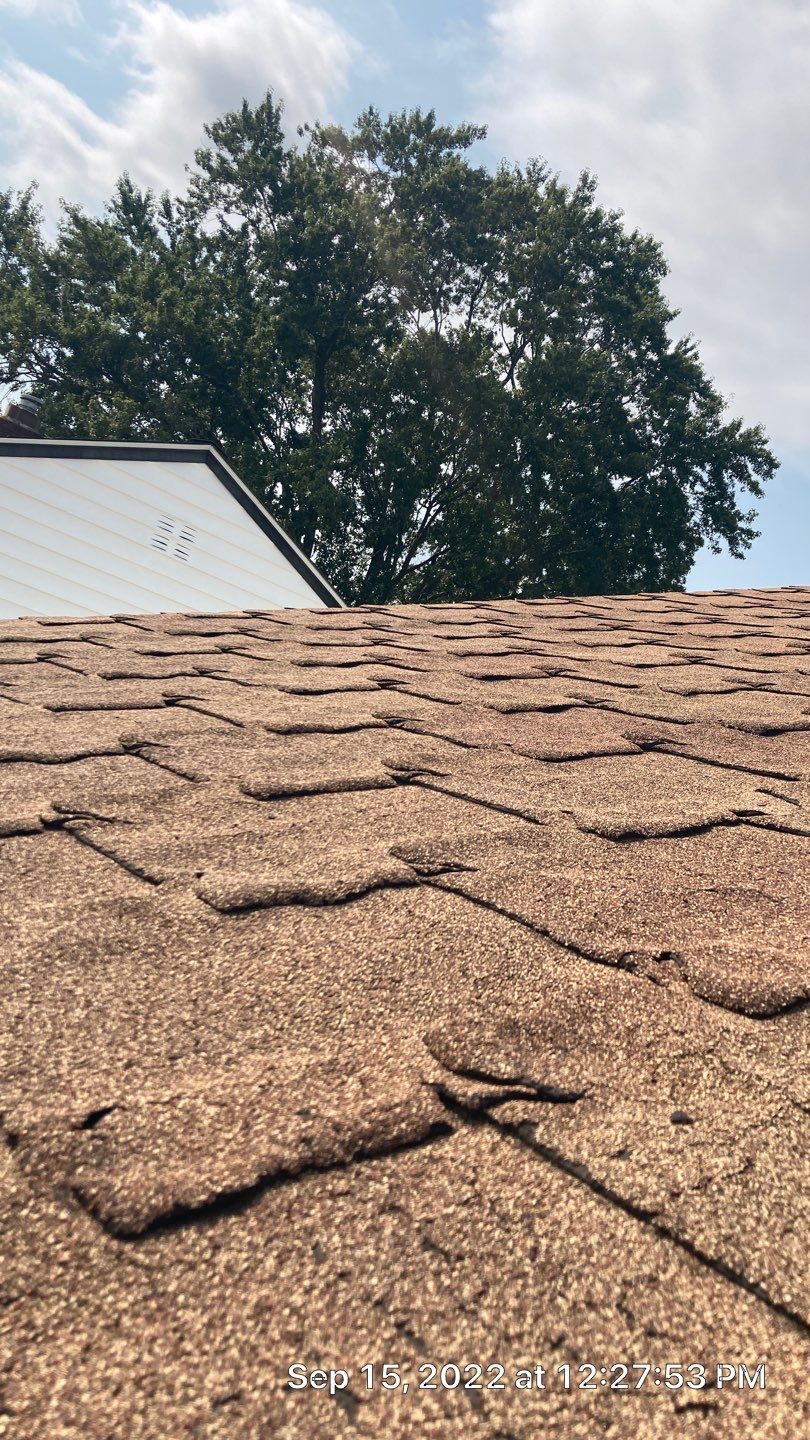Residential Roofing Installation by Absolute Roofing and Construction