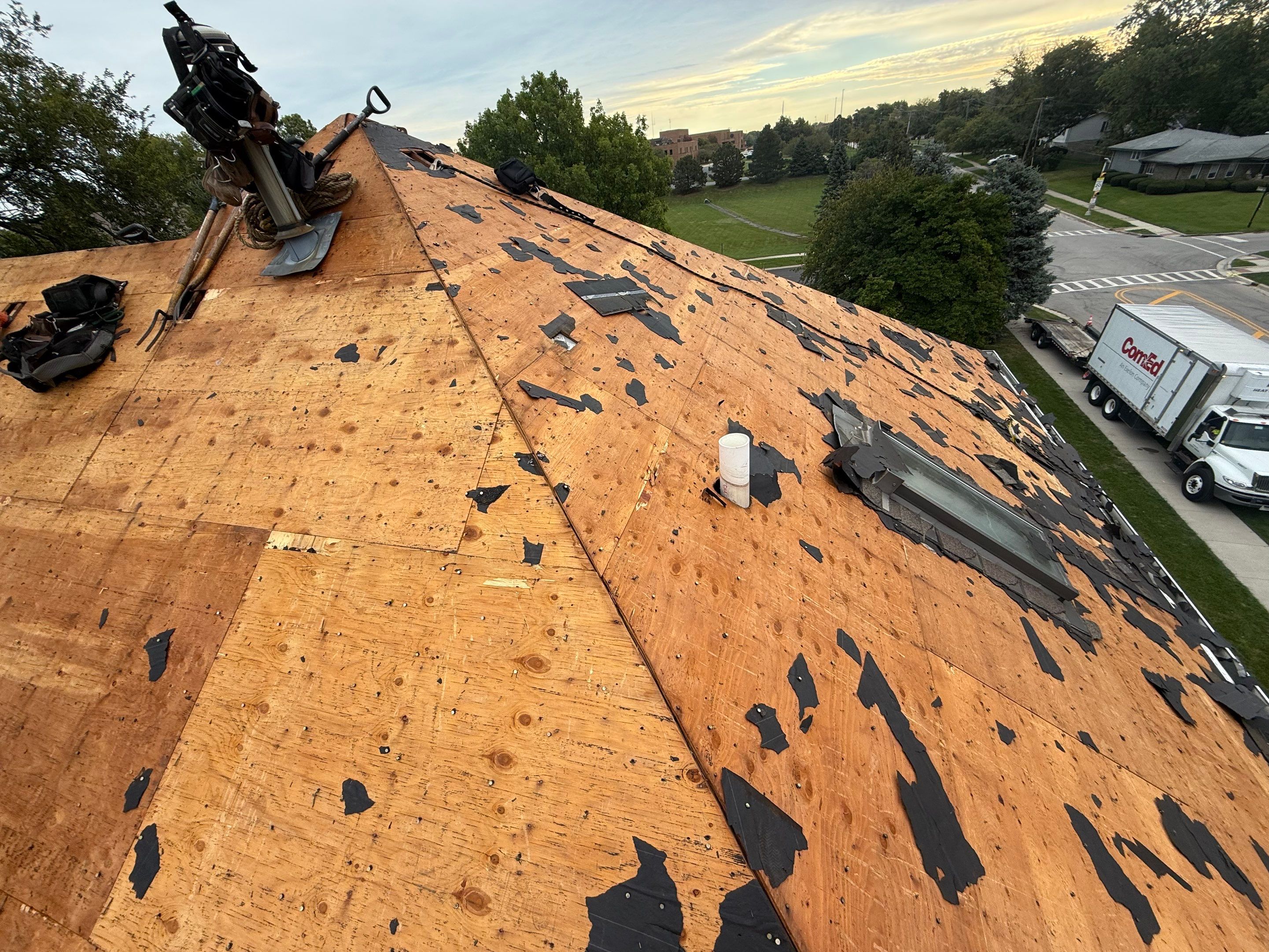 Roof and windows by Optimal Home Improvement 