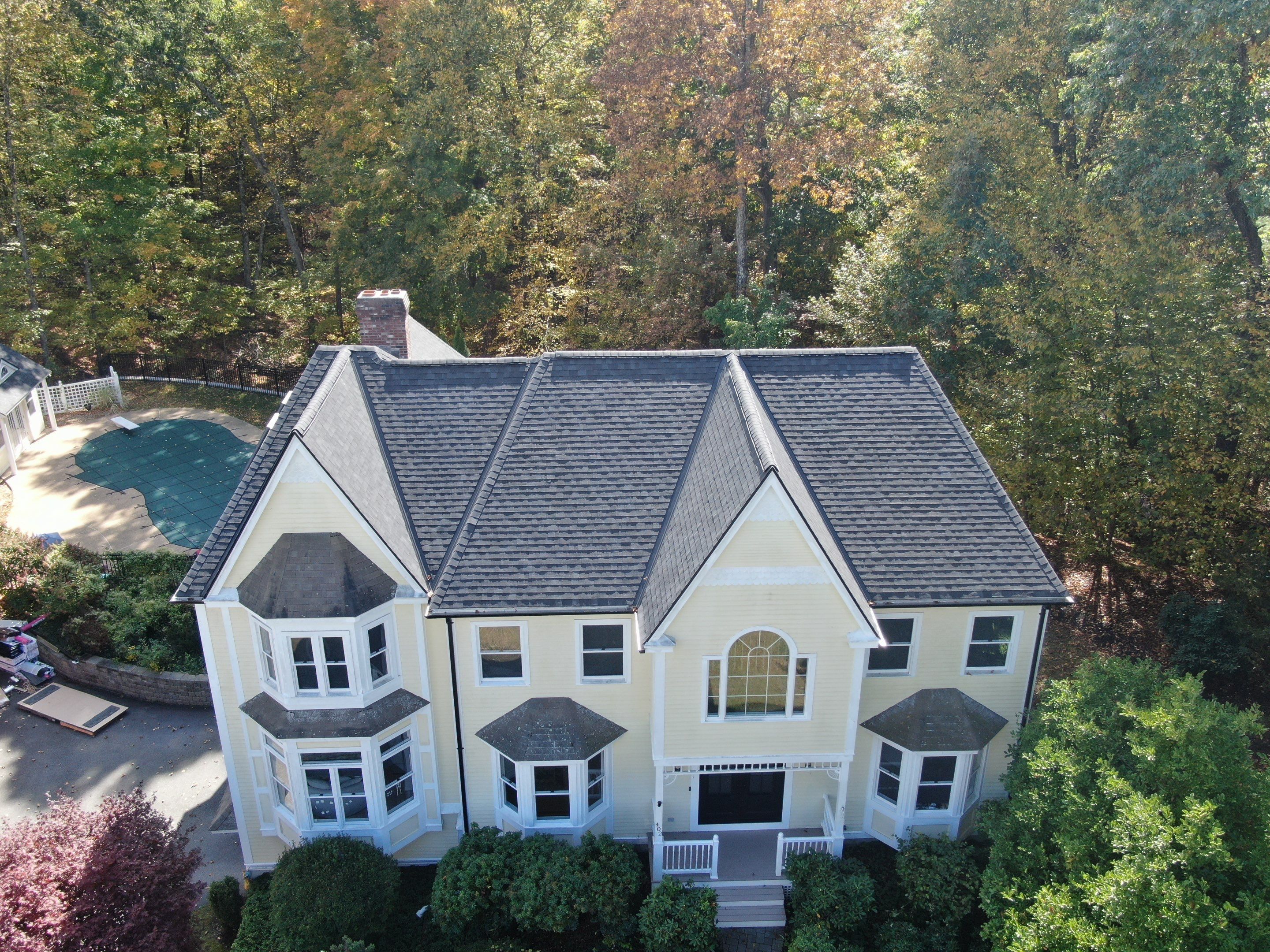 New Roof, Skylights, and Metal Accent Roof Installation in Groton by Mighty Dog Roofing of Greater Middlesex County