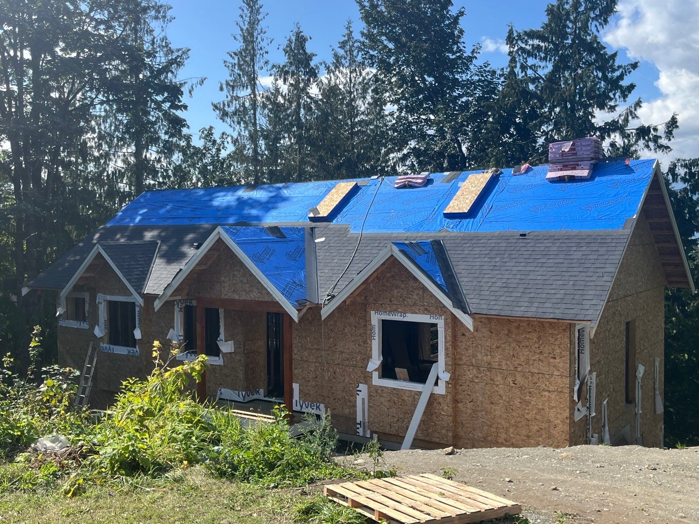 Residential Roofing Installation using OC Oakridge shingles by Top Notch Roofing Inc