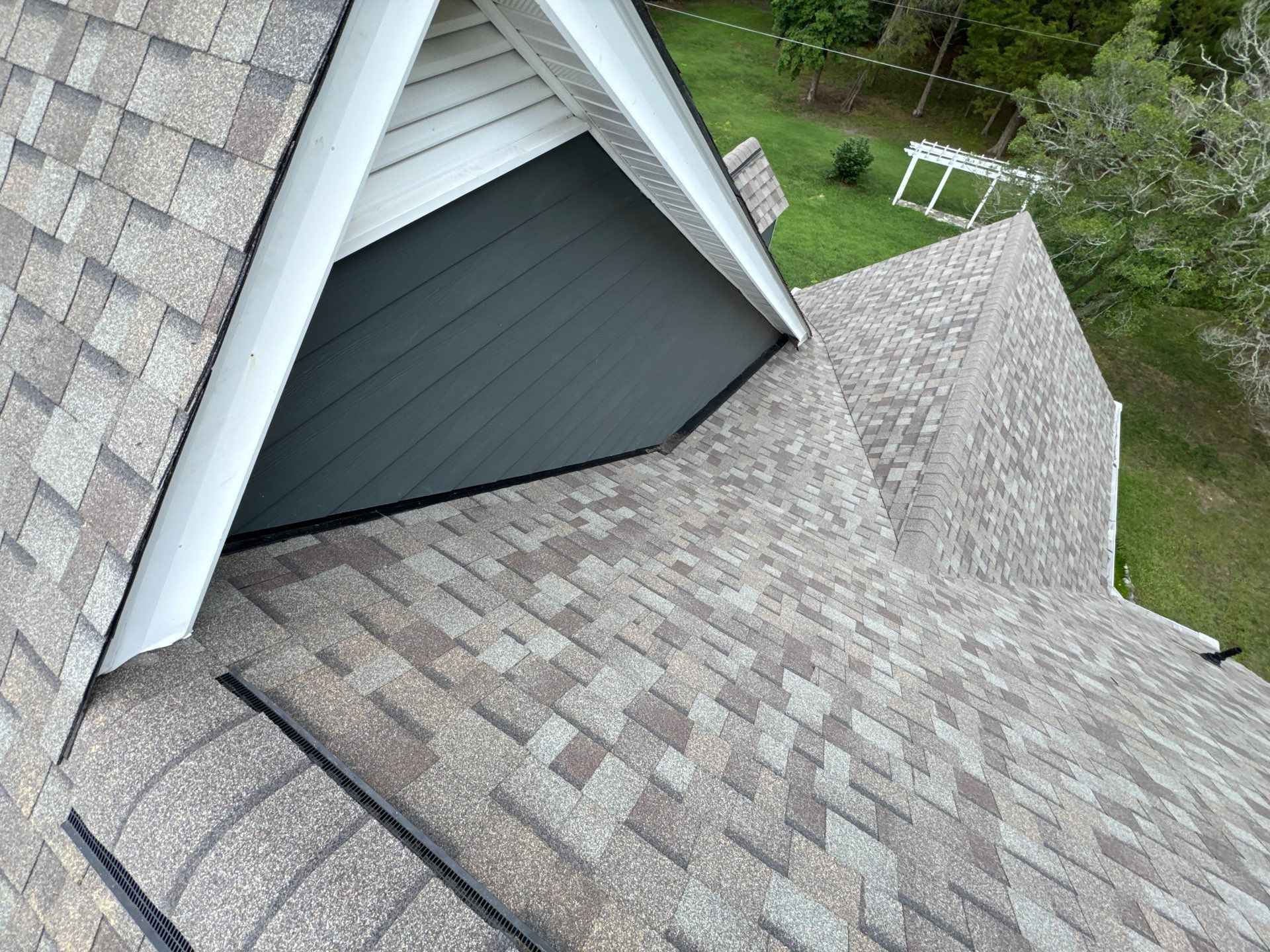 Roof Replacement and White Gutter Installation in Gloucester by Cade Construction