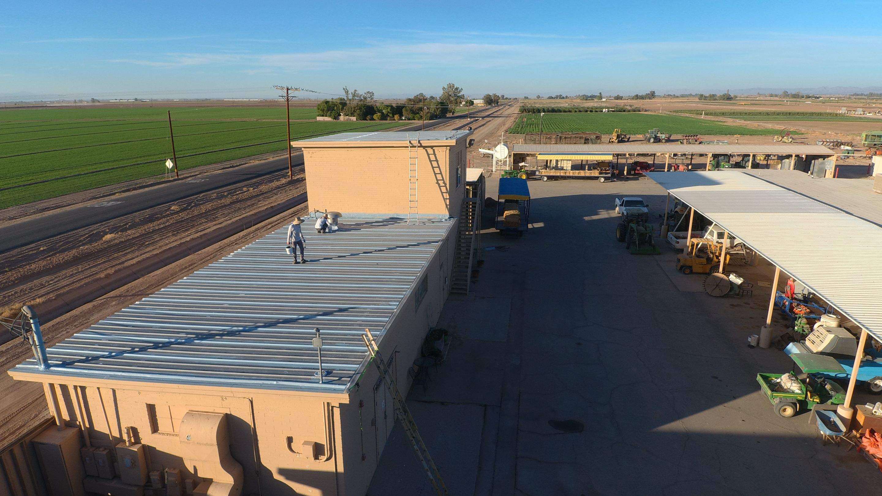 Metal roof restoration on commercial roof using Conklin Benchmark/PUMA XL fabric and coating by Straight Edge Roofing Inc