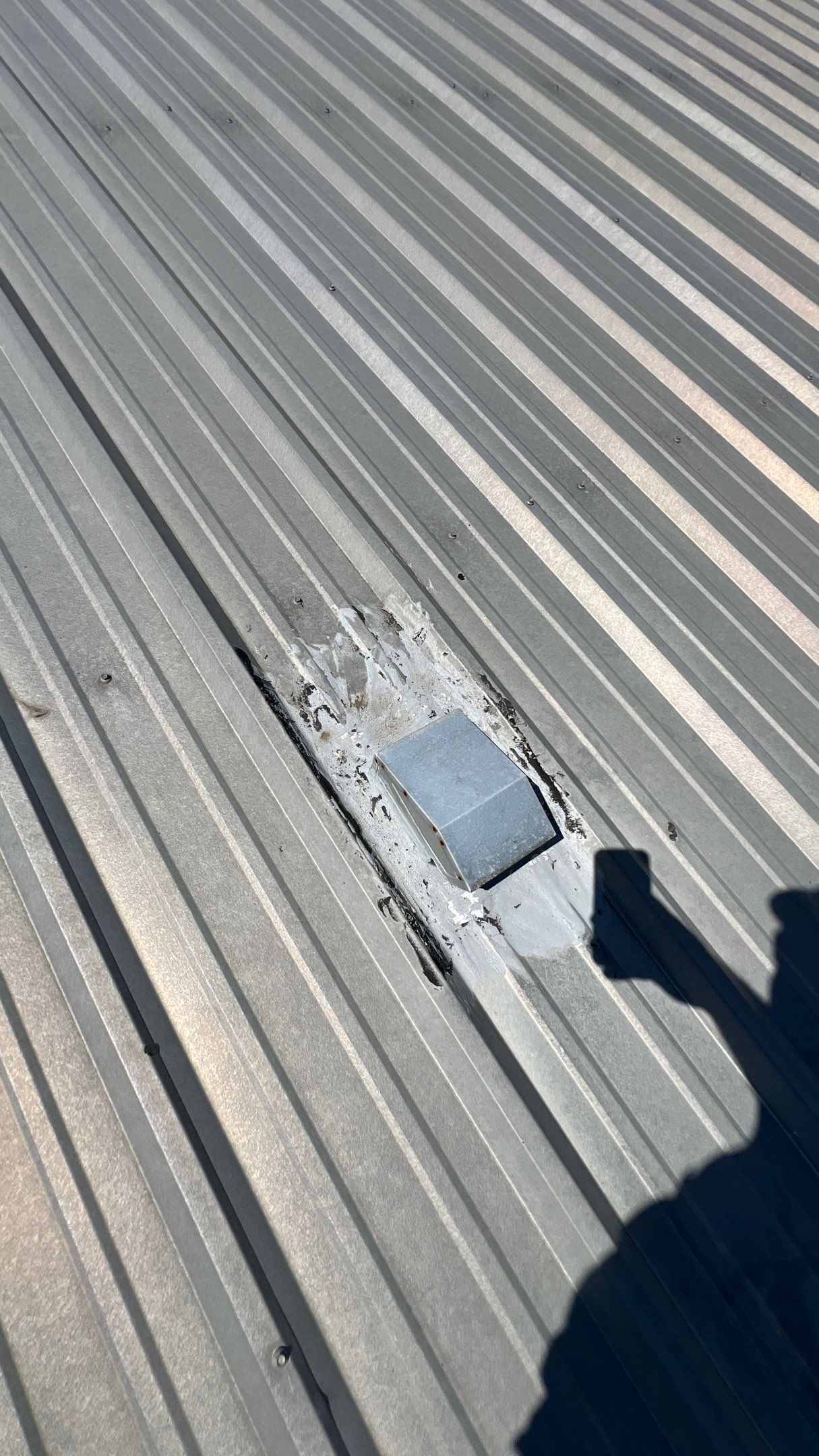 Commercial Roofing Installation using TRP #924 Eterna-Sil Premium Silicone Roof Coating by Harvey Roofing & Construction