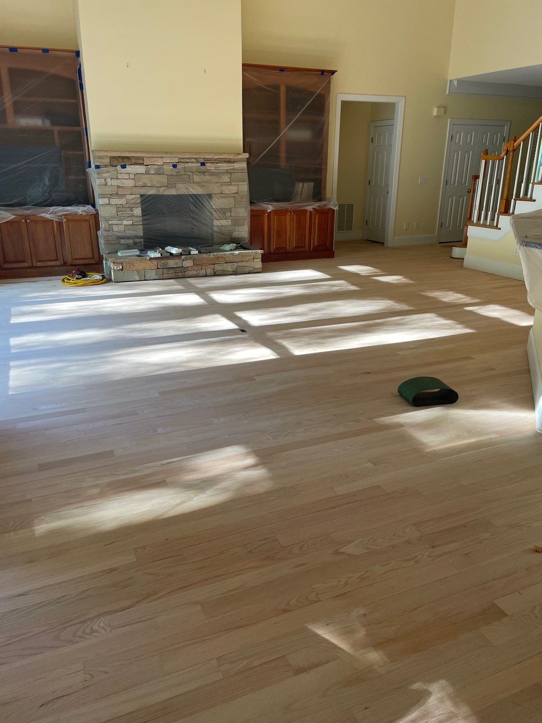 Added flooring, refinished all the floors by Accent Custom Floors