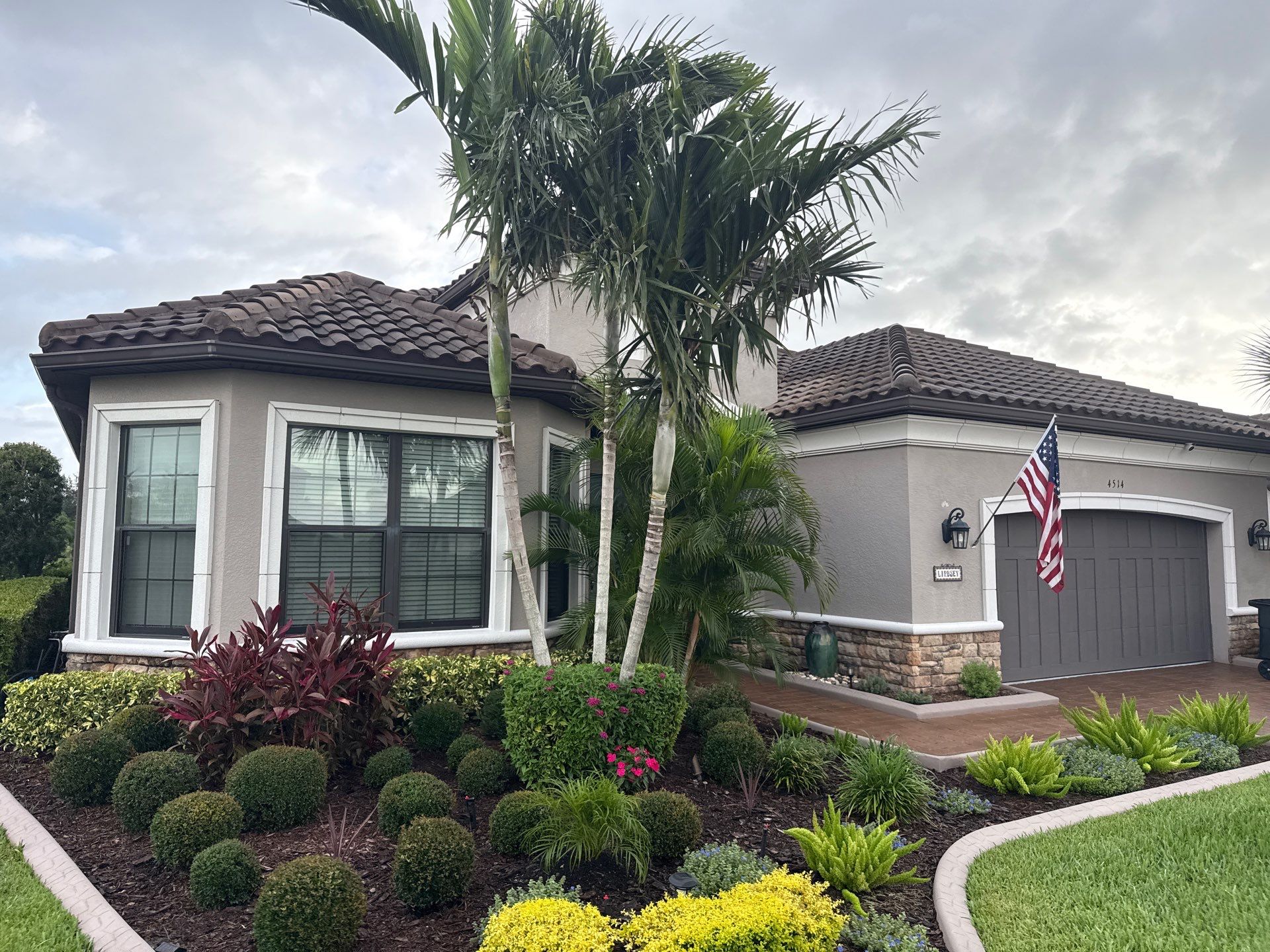 Neighboring Tile Roof Cleaning with Gutter Runoff Control – Palmetto, FL by Sunshine AquaWash