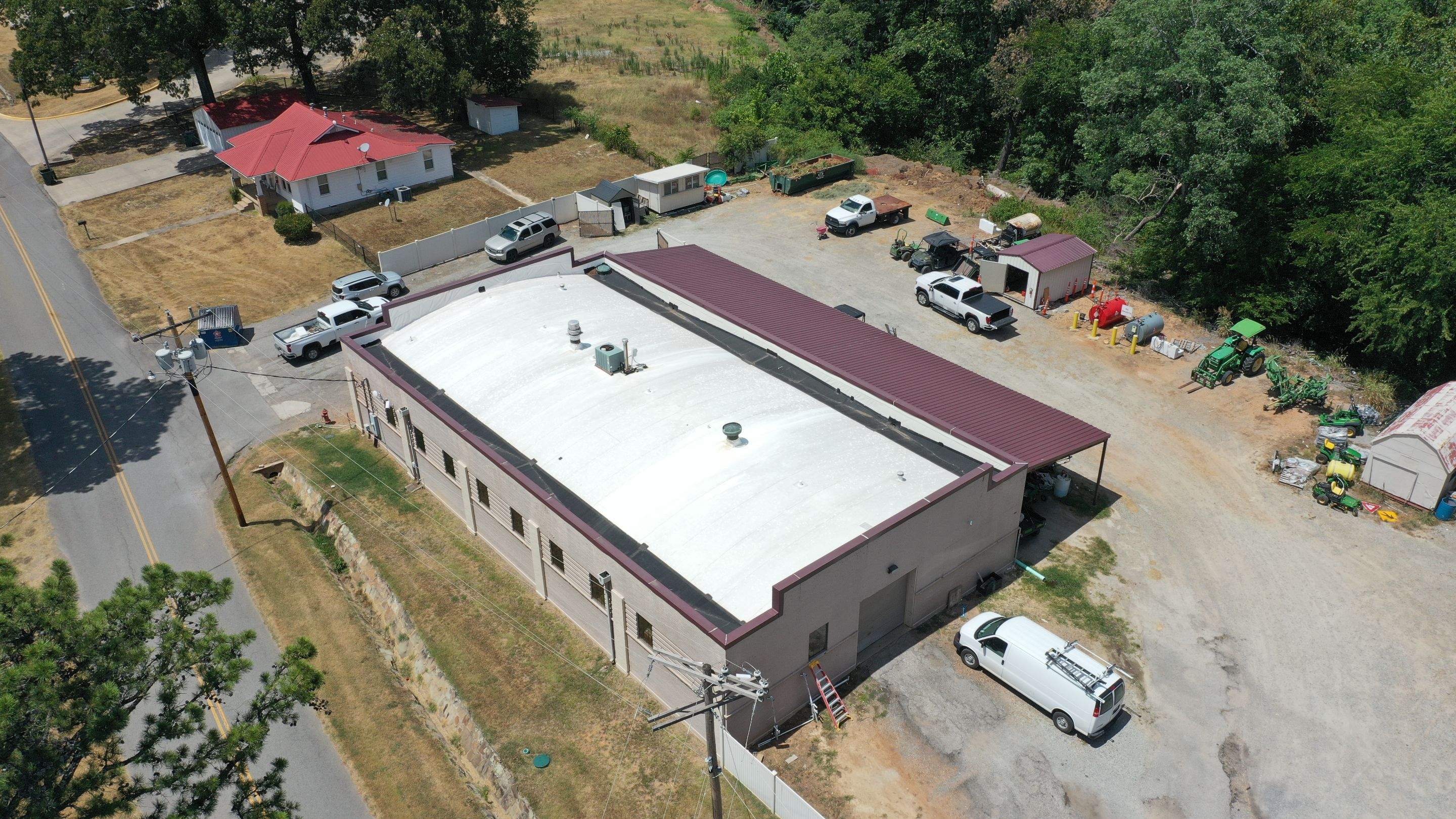 Choctaw Nation Healthcare Center - White Building by Hostetler Roofing