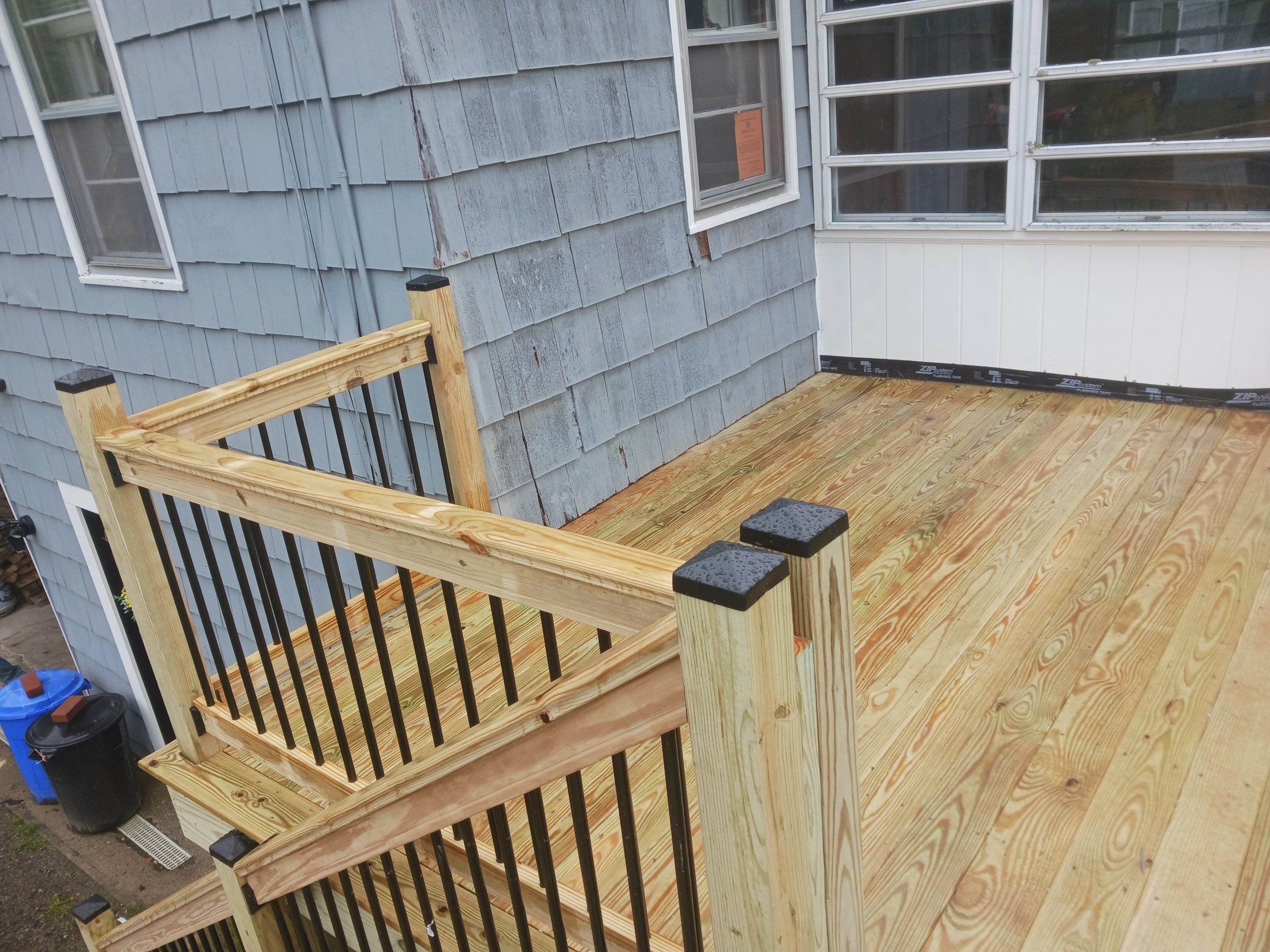 Moultonborough, NH – Pressure-Treated Deck Installation by Tall pine roofing
