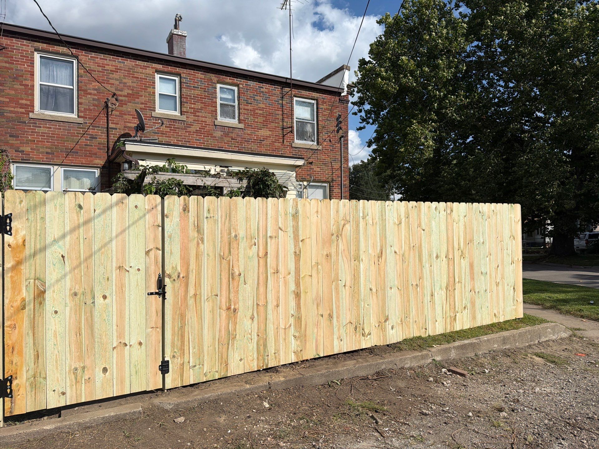 New Treated Wood Privacy Fence and Metal-Framed Gates by Perfect Picket Fence and Stain