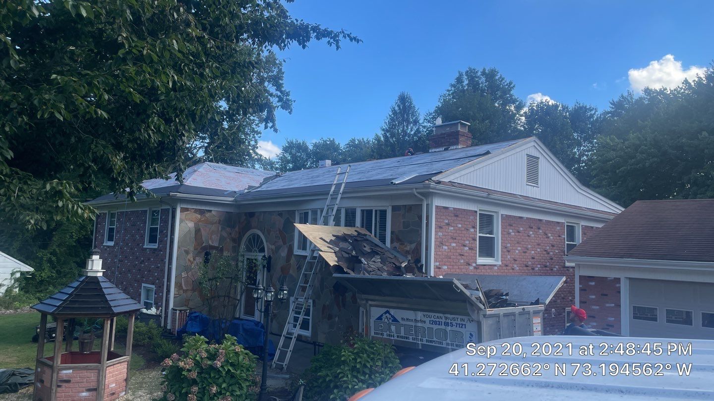 Residential Roofing Installation using Owens Corning Duration Slatestone Gray by A Plus Exterior