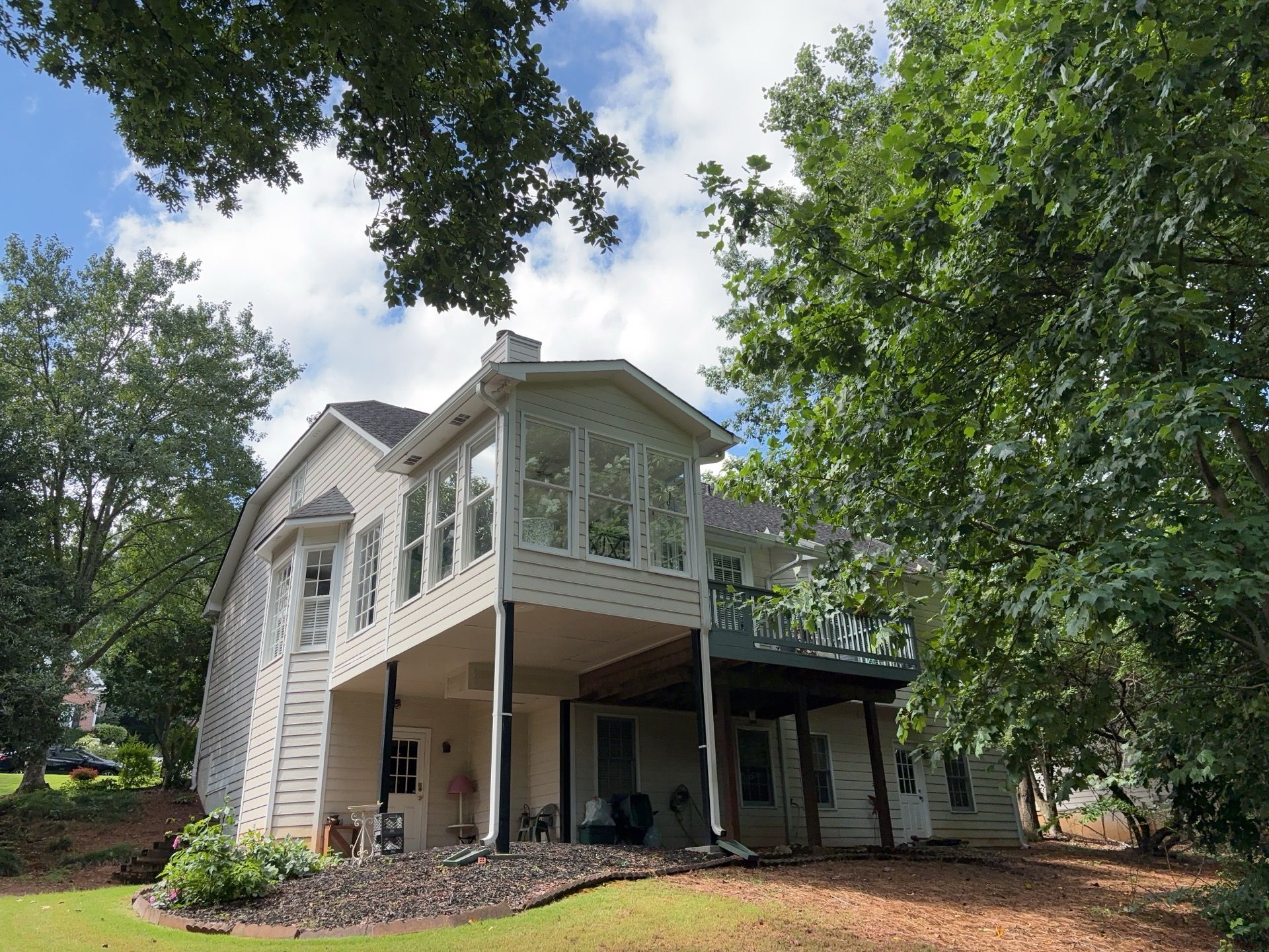 Blue Exterior Paint and Siding Installation using James Hardie Lap Siding by Nelson Exteriors