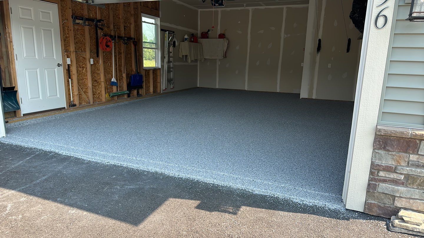 Silverado garage floor coating  by NG Masonry & Construction LLC