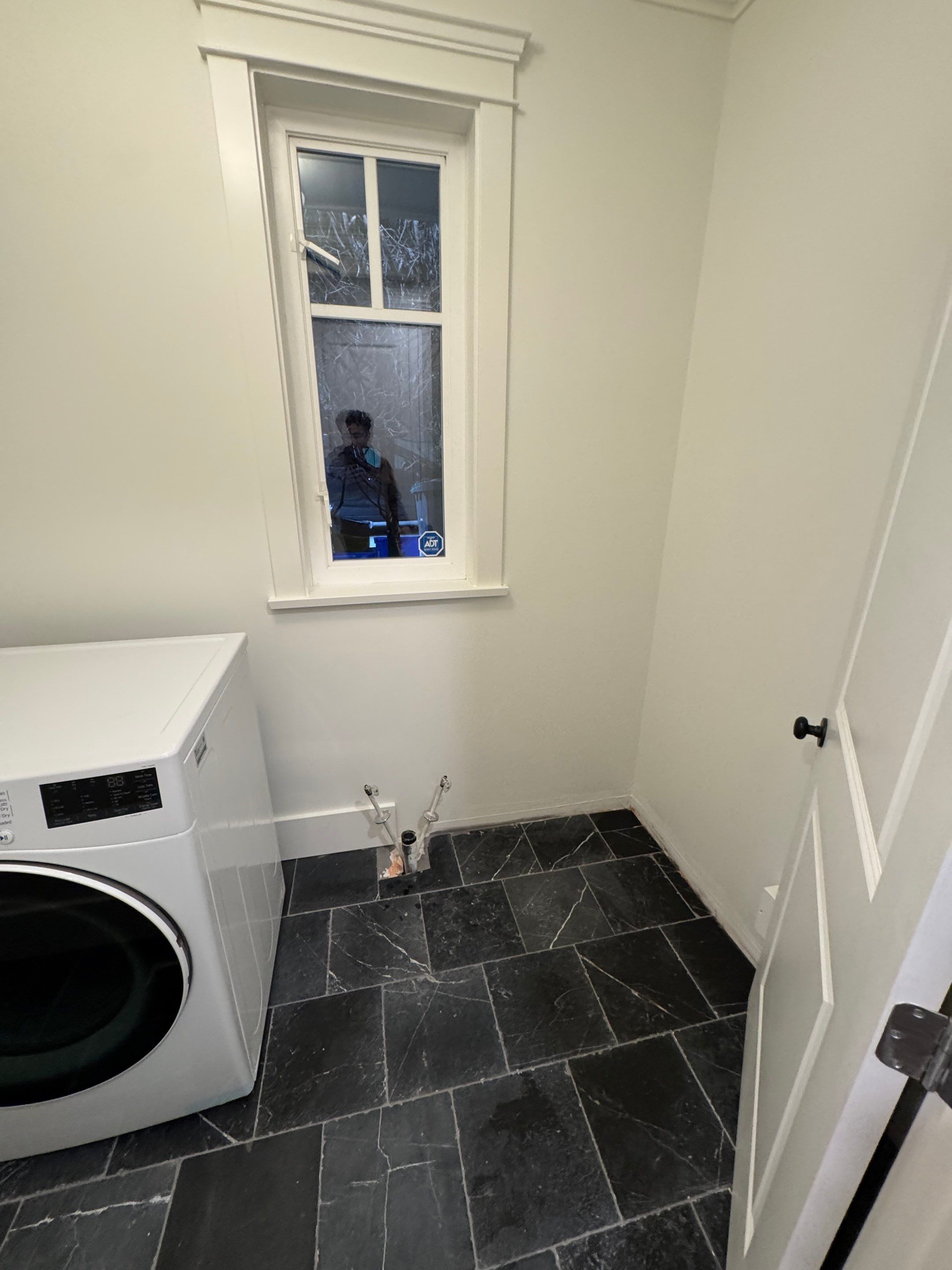 High-End Laundry Room Renovation and Restoration in Vancouver by YVR Construction Group