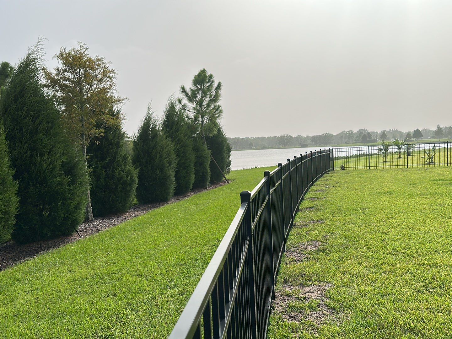 Aluminum Fence Installation using Black 3 Rail Aluminum Fence by Asap fence and gates, LLC