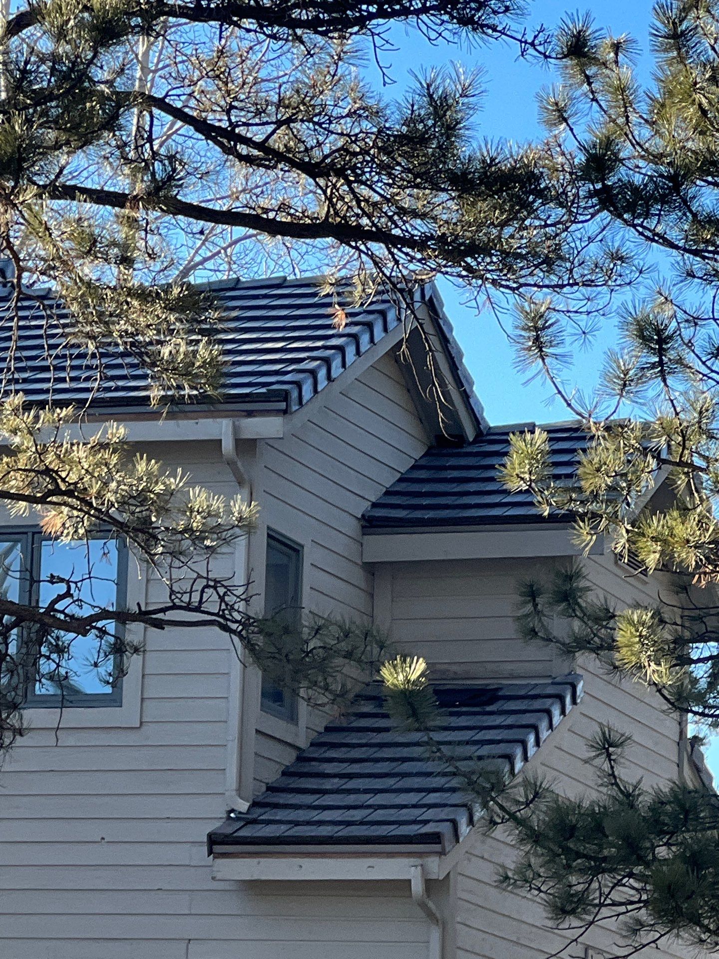 Residential Roofing Installation using Concrete Tile by Blue Peaks Roofing LLC 