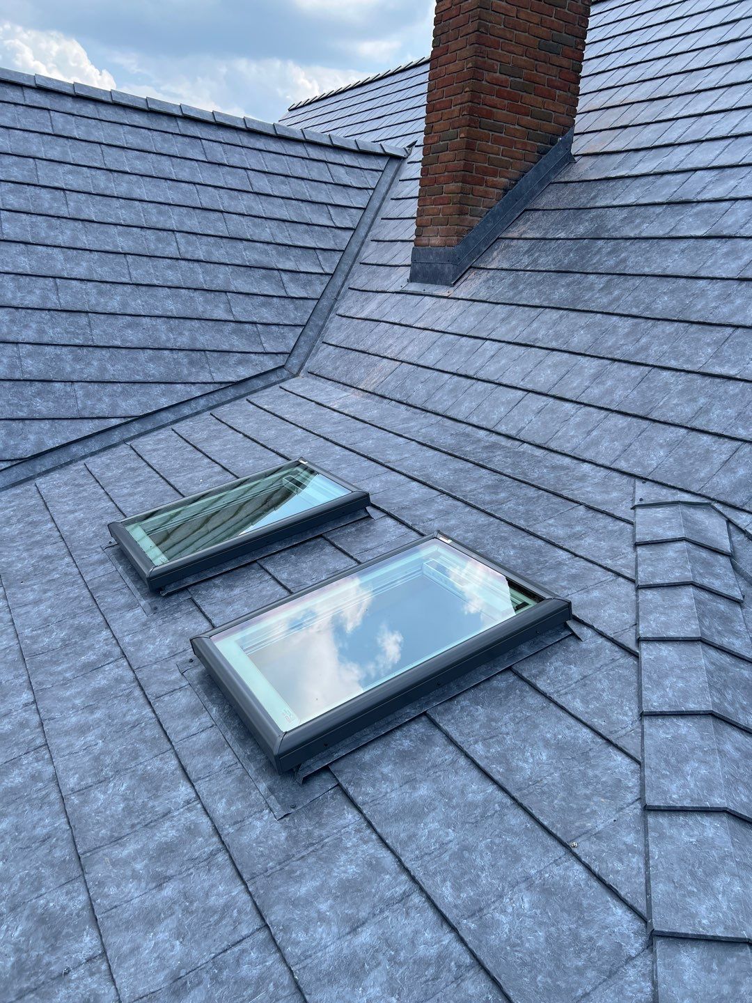 Residential Roofing Installation using ProVia Ironstone Slate Metal Roofing by RoofX 