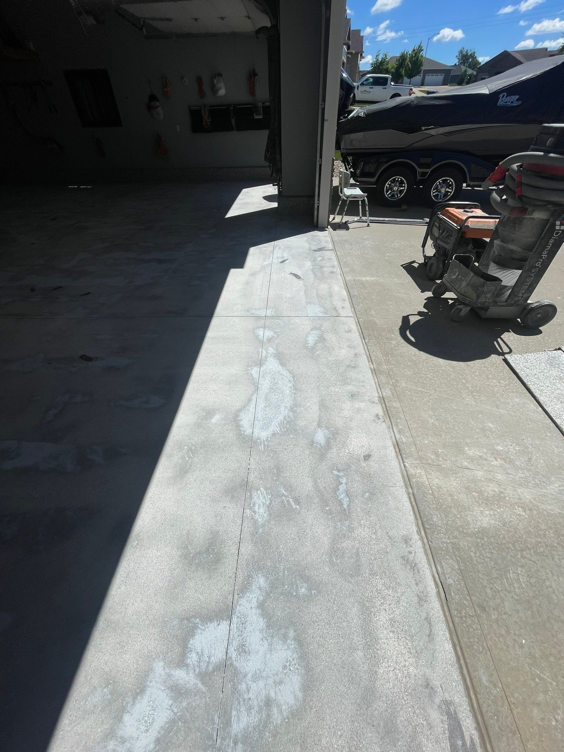 Residential Garage Floor Coating in Sioux Falls by Select Painting, Coatings & Garage Cabinets