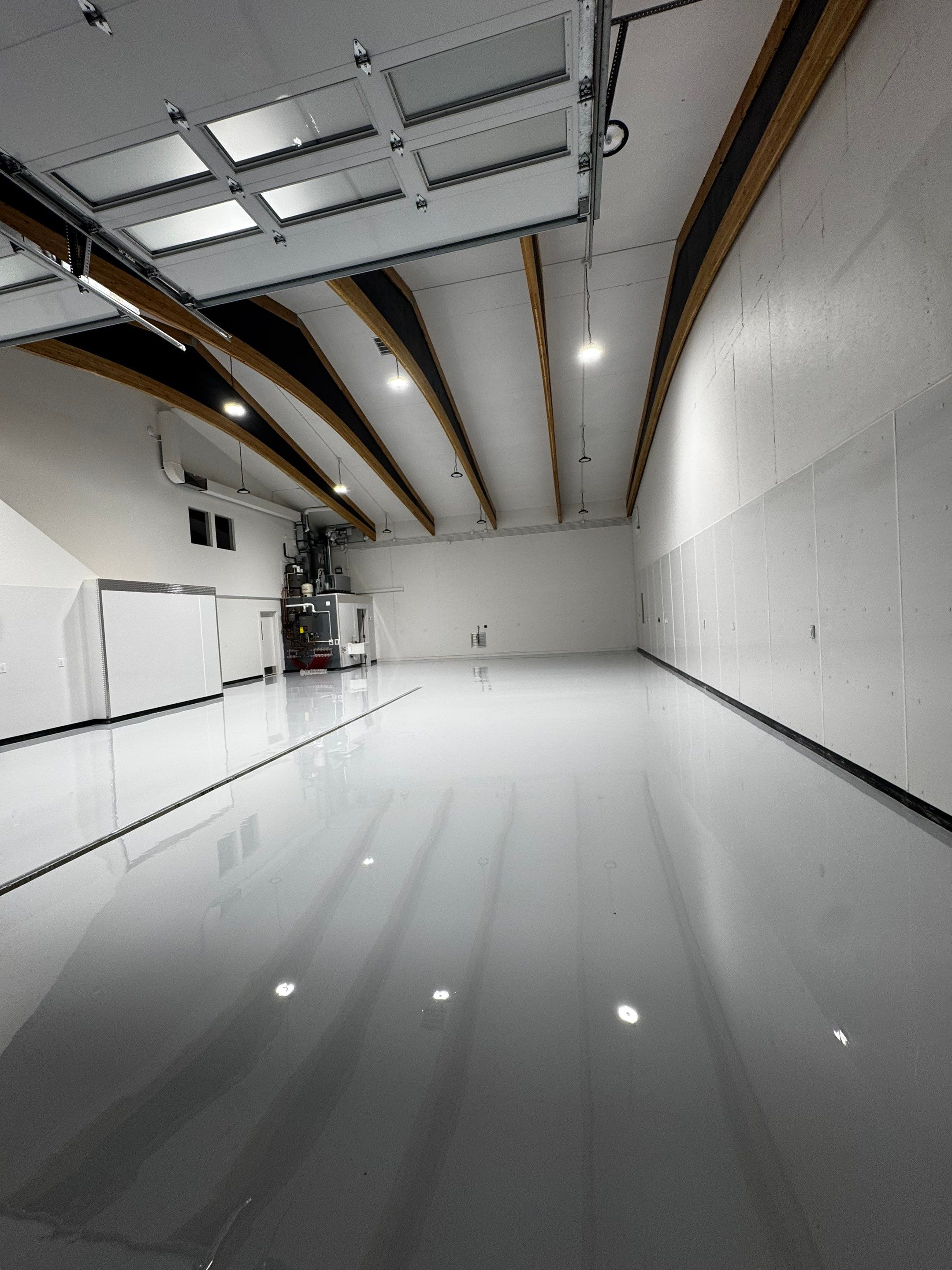 Colfax Commercial Shop Transformation With Vapor Mitigating Floor Coatings by Croc Coatings, LLC