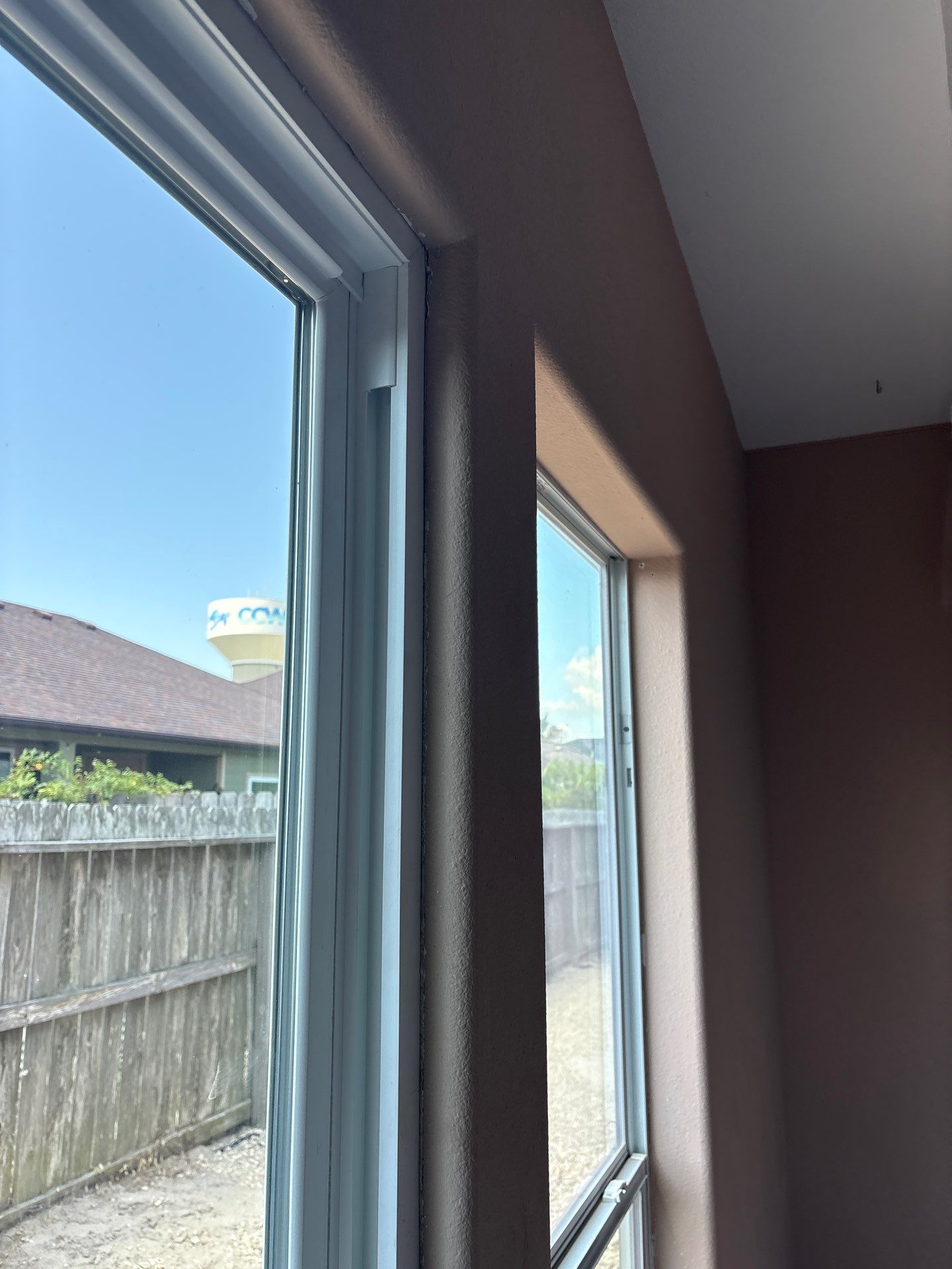 Curved Trim Windows by Bayfront Roofing and Construction