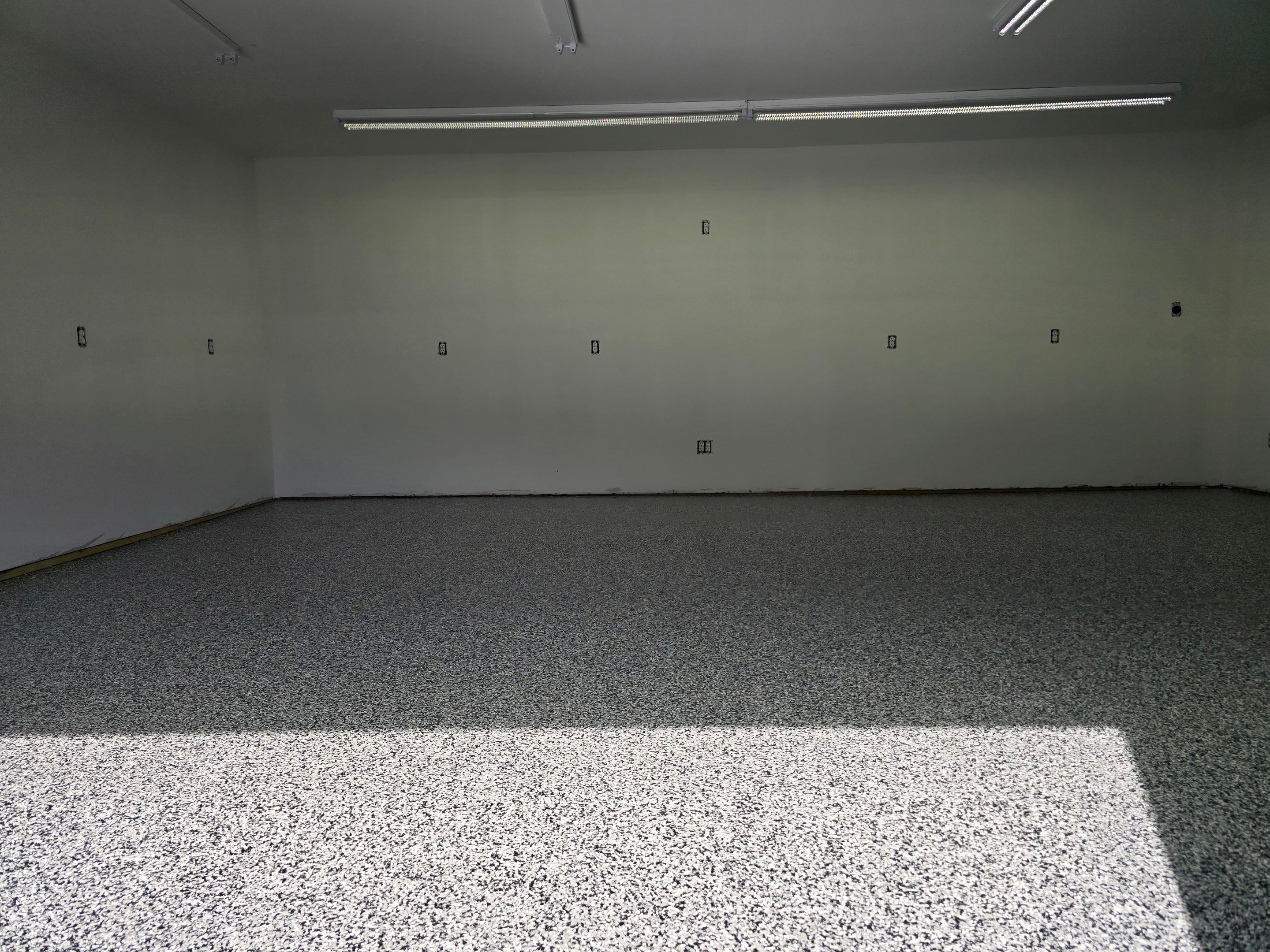 Garage using Domino by Elite Floor Solutions