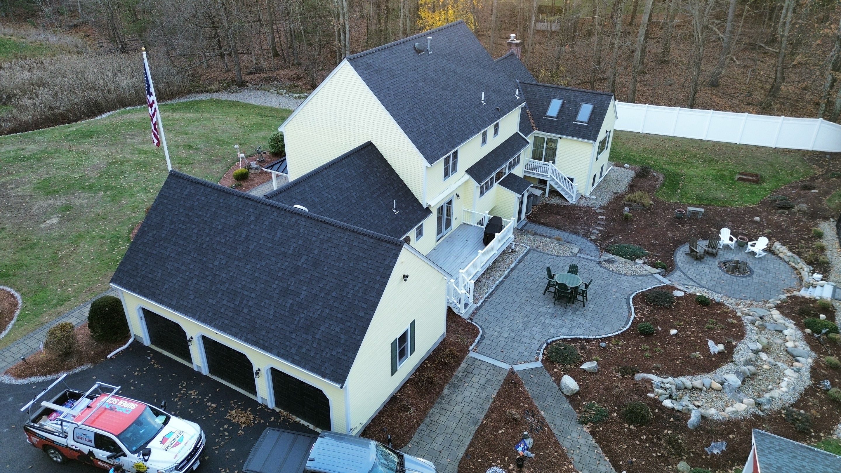 Chelmsford Premium Roof: Onyx Black Shingles with Standing Seam Metal Porch by Mighty Dog Roofing of Greater Middlesex County