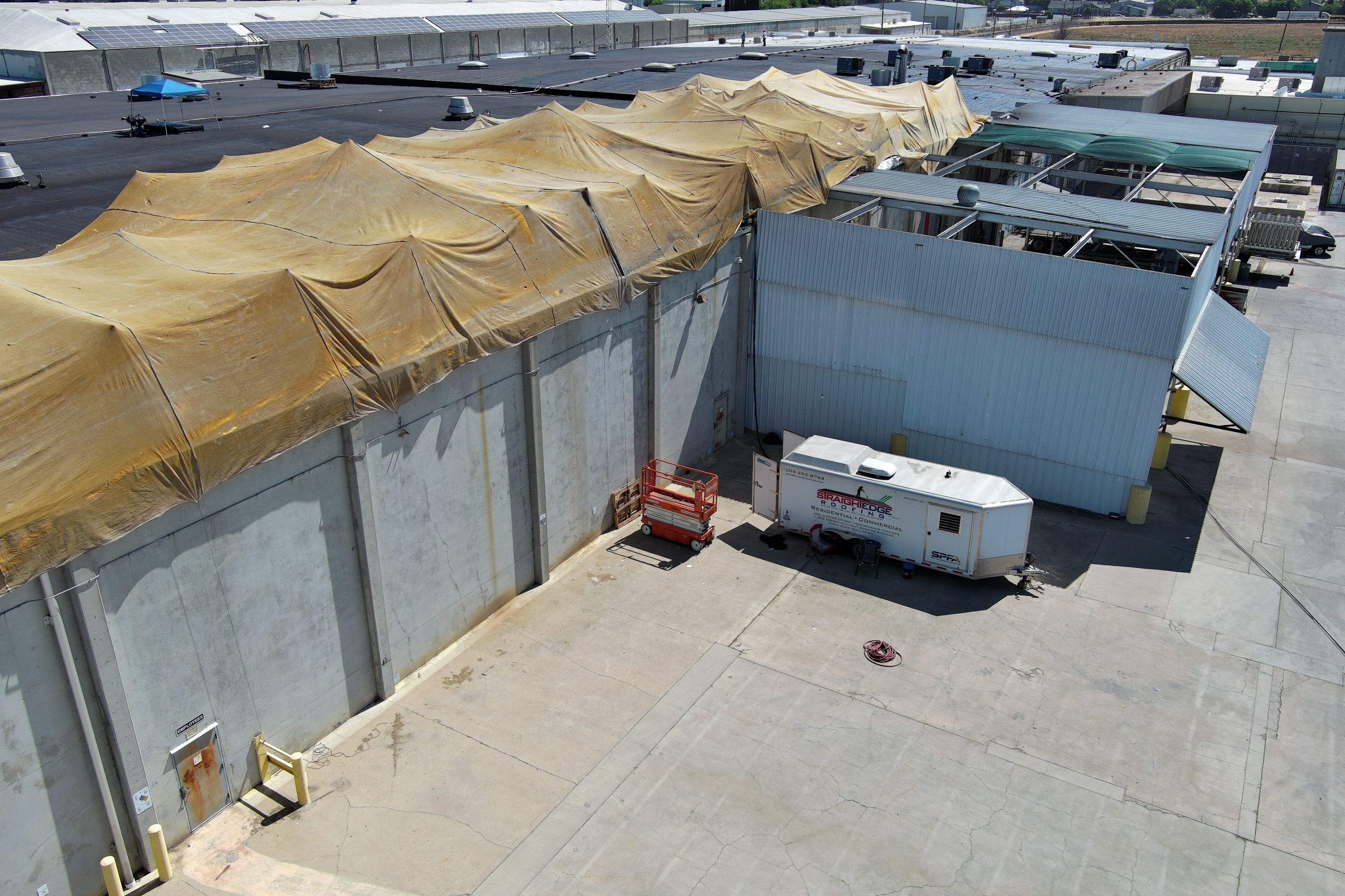 Pro Farms Spray foam roofing project by Straight Edge Roofing Inc