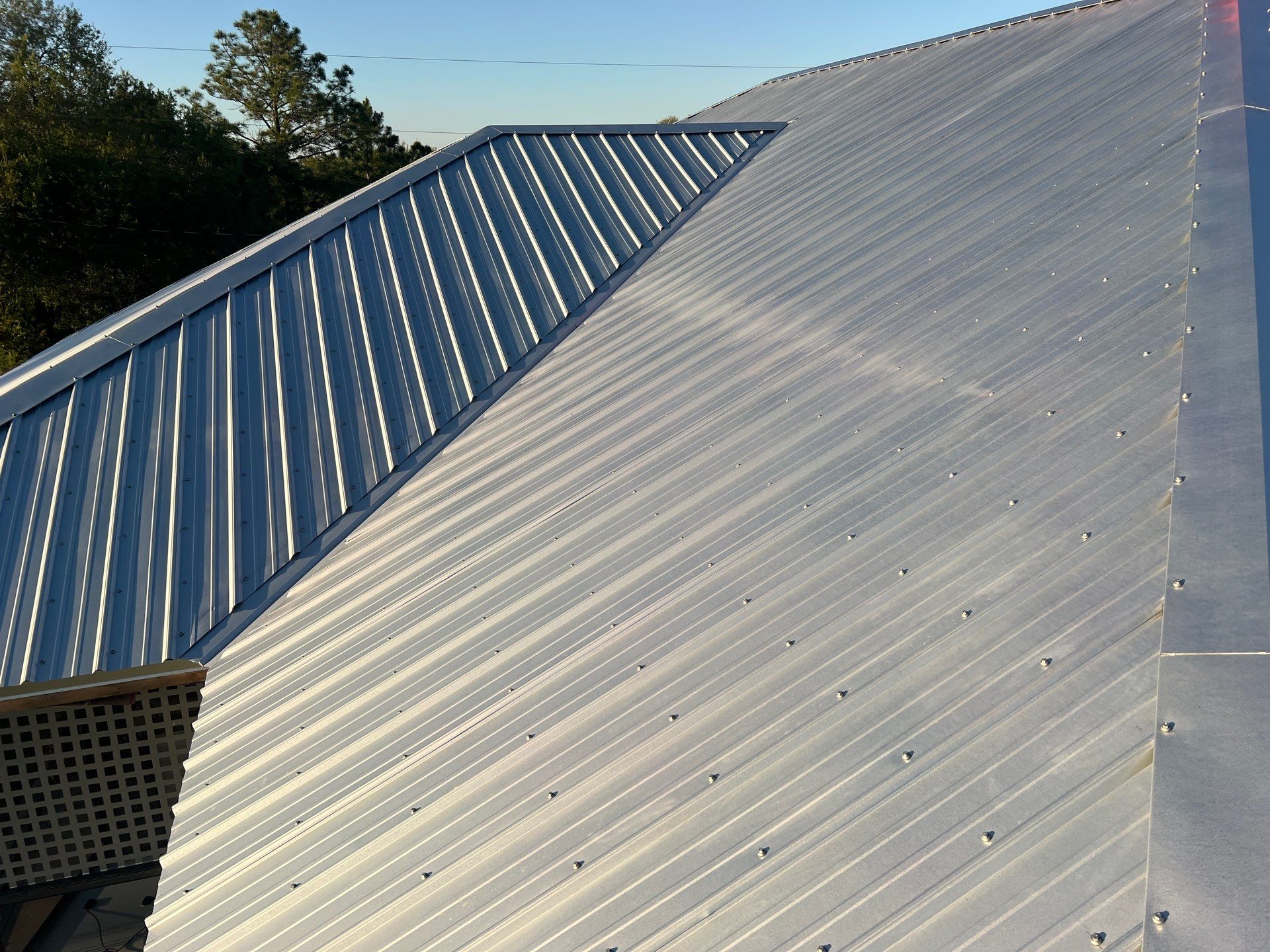 Residential Roofing Installation using Durabull Classic Rib Panel by Durabilis Roofing INC