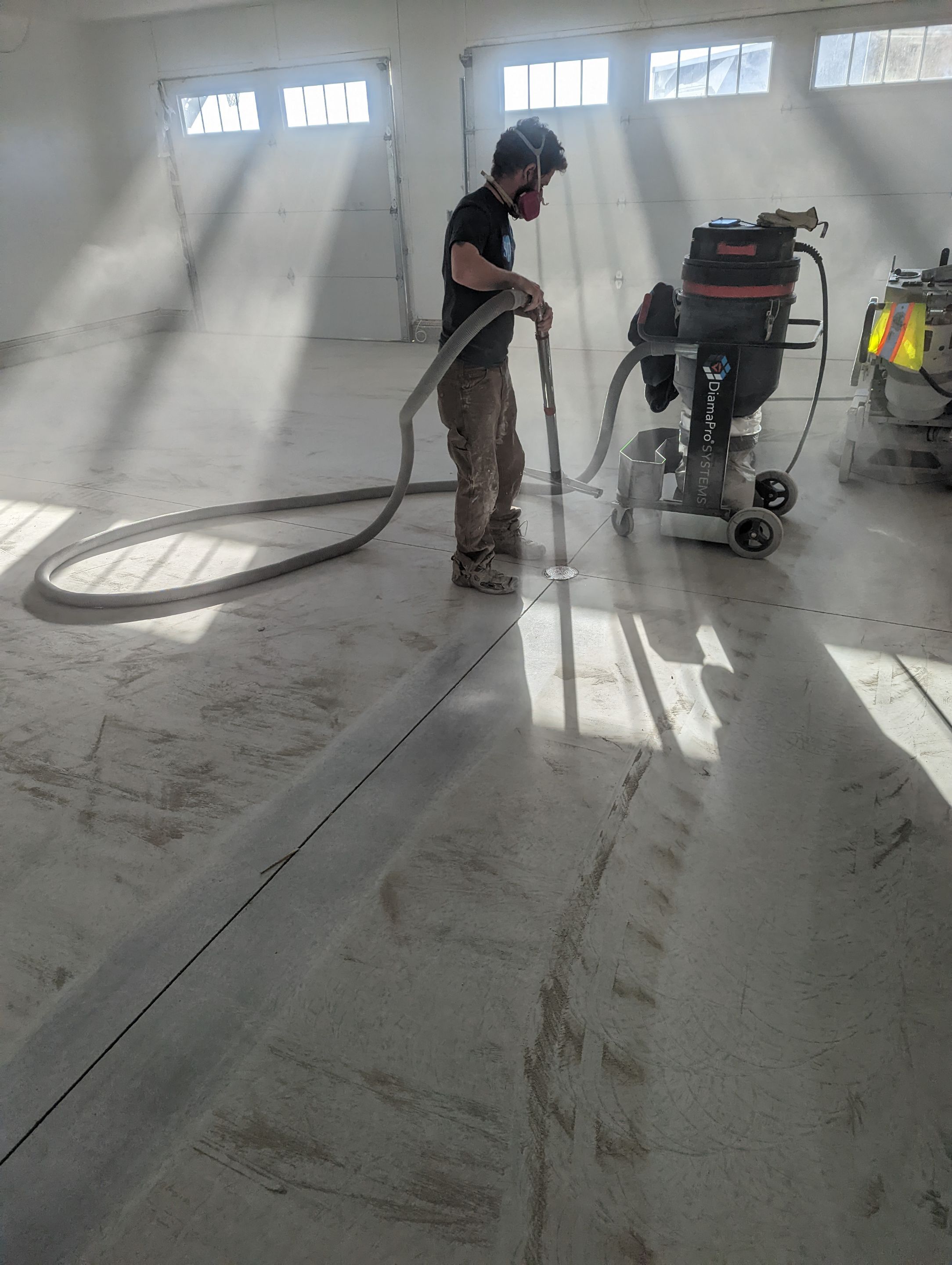 Garage using Domino  by Select Painting, Coatings & Garage Cabinets