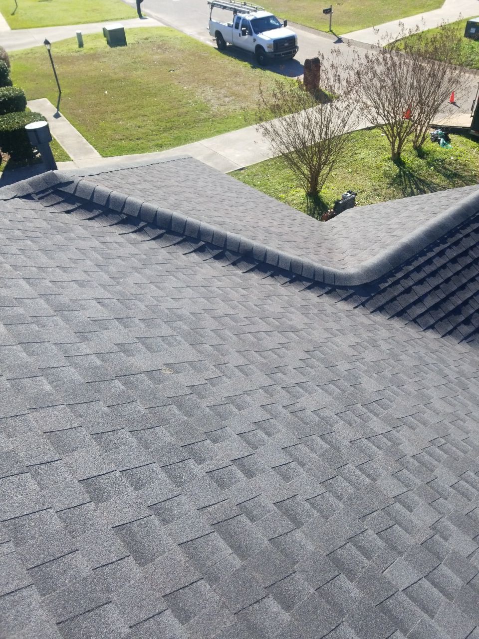 Residential Roofing Installation using Roof Replacement by American Roofing & Construction LLC
