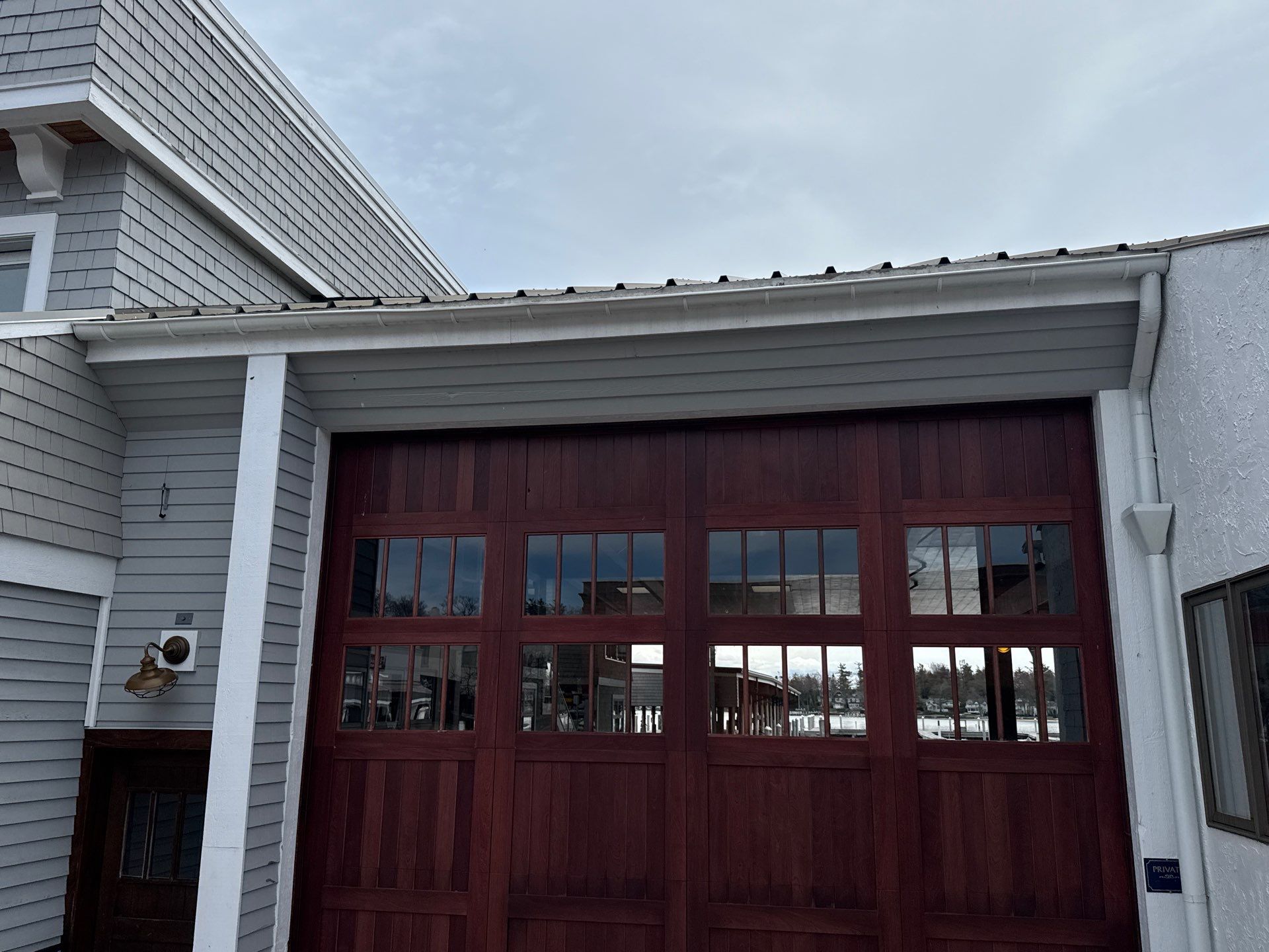 Gutter and Downspout Installation for Harbor Springs Boat House by Rainbow Seamless Systems