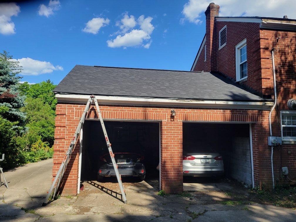 Oakridge Onyx Black and Black Gutters by 317 Roofing & Restorations