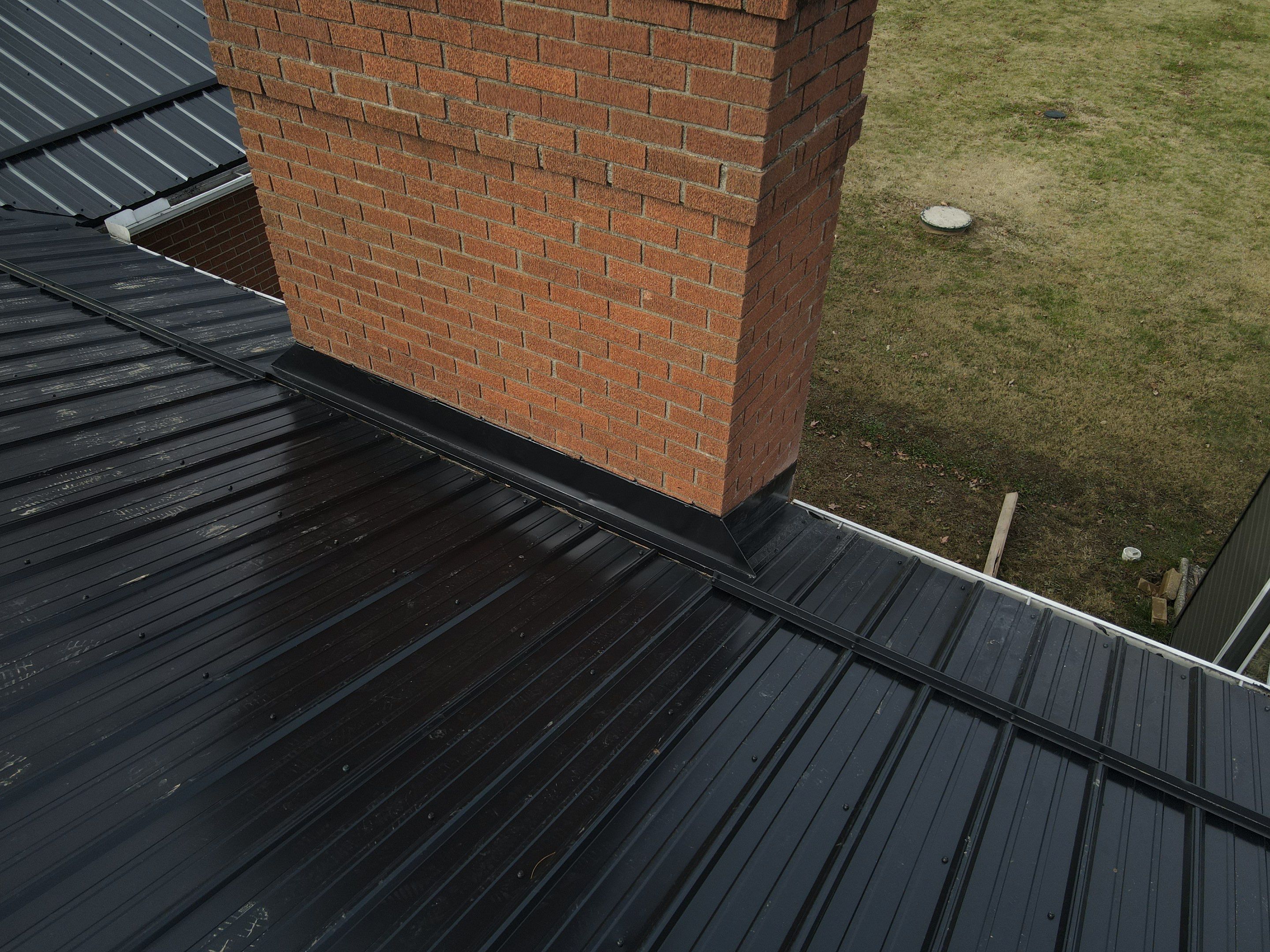 Residential Roofing Installation using Perfromance Panel Metal - Black by RoofX 