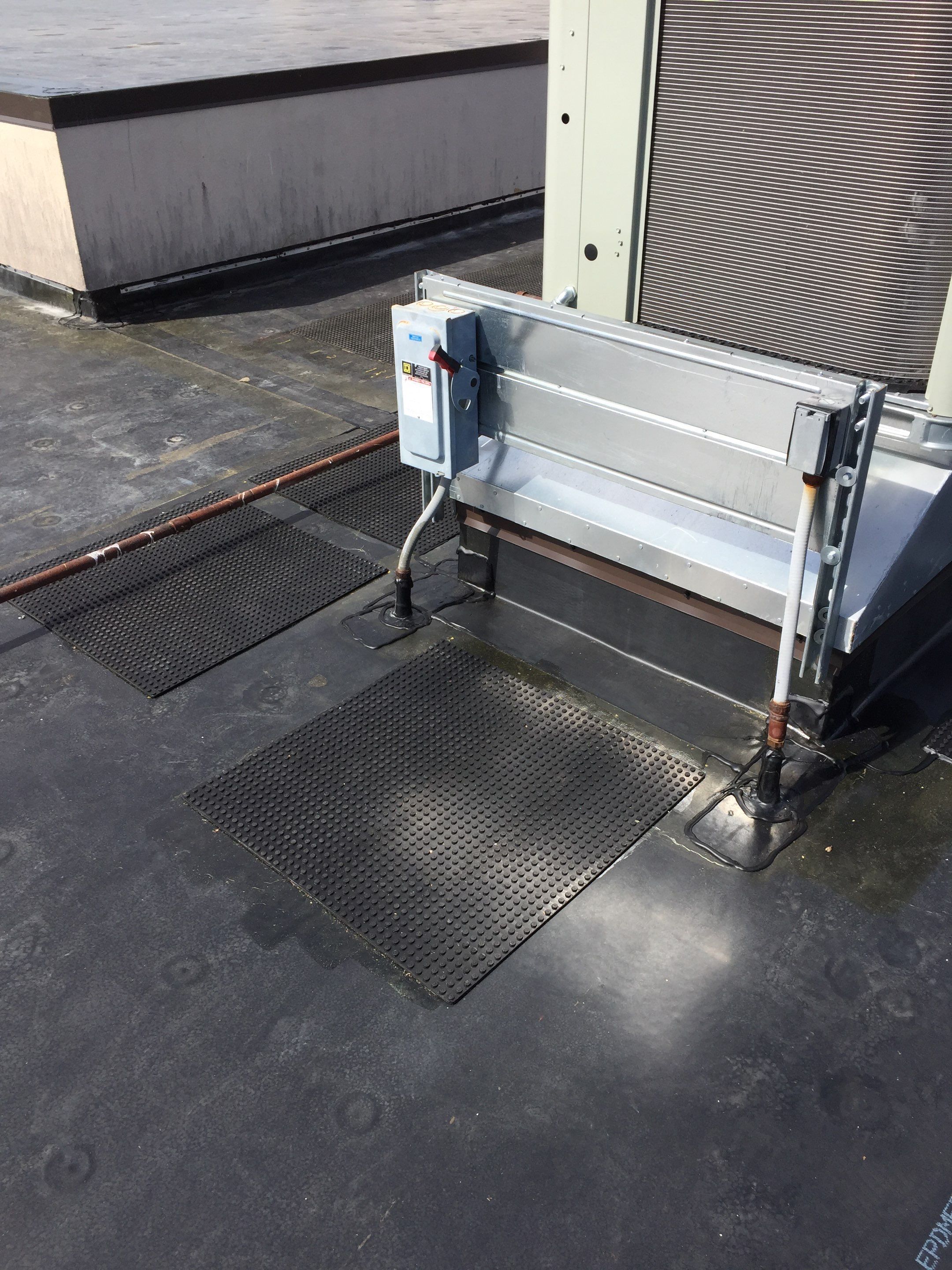 Commercial Rubber Roofing  using Carlisle Rubber Roofing System by Secure Construction Company Inc