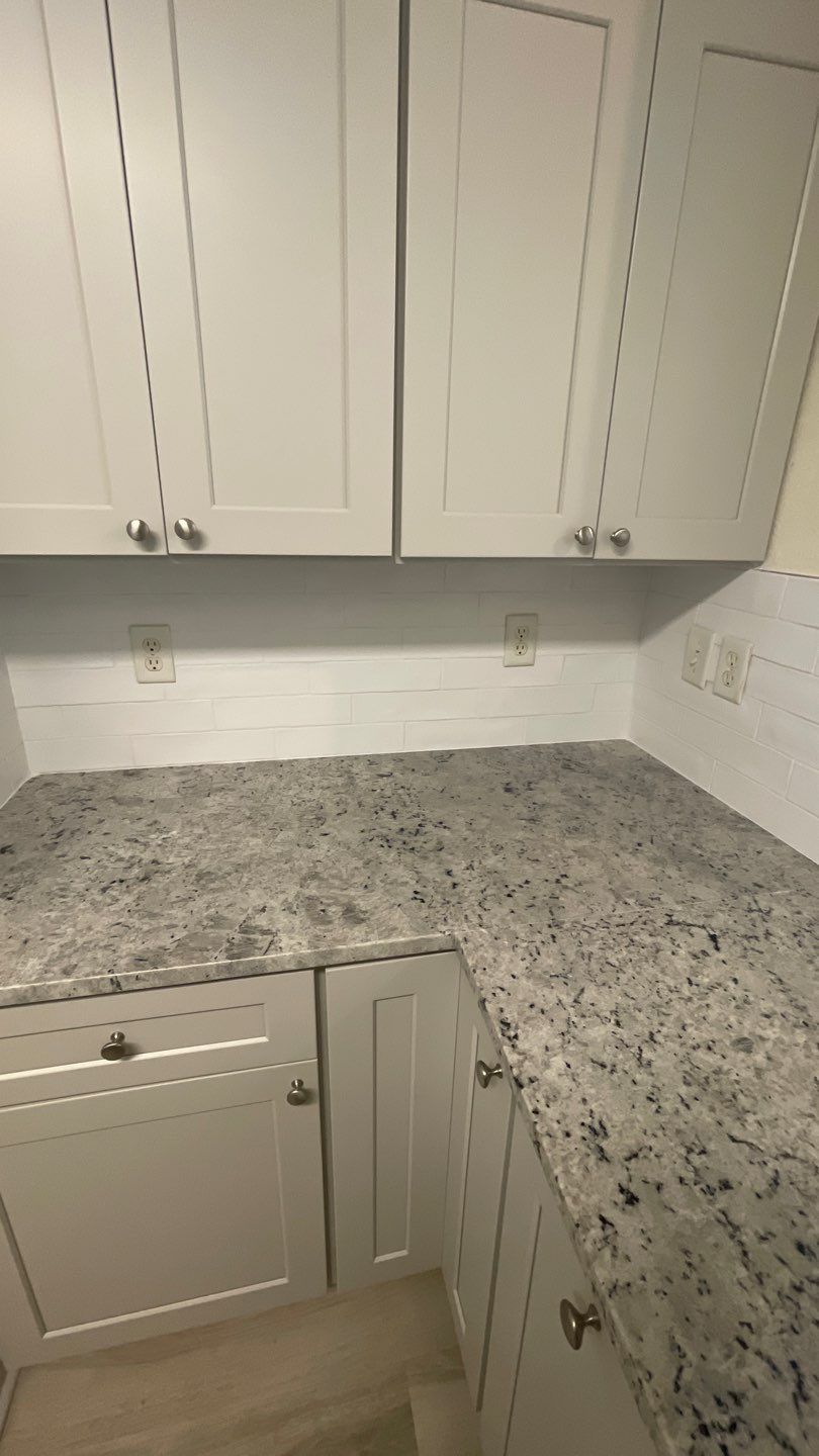Home Remodel using LVP Flooring and Cabinets by HandyMangum