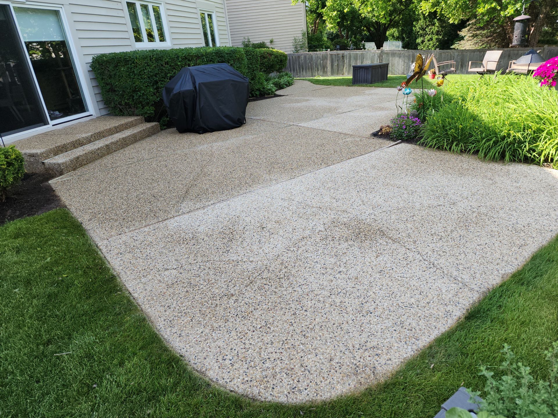 Aggregate concrete cleaning by Northern Power Washing LLC.