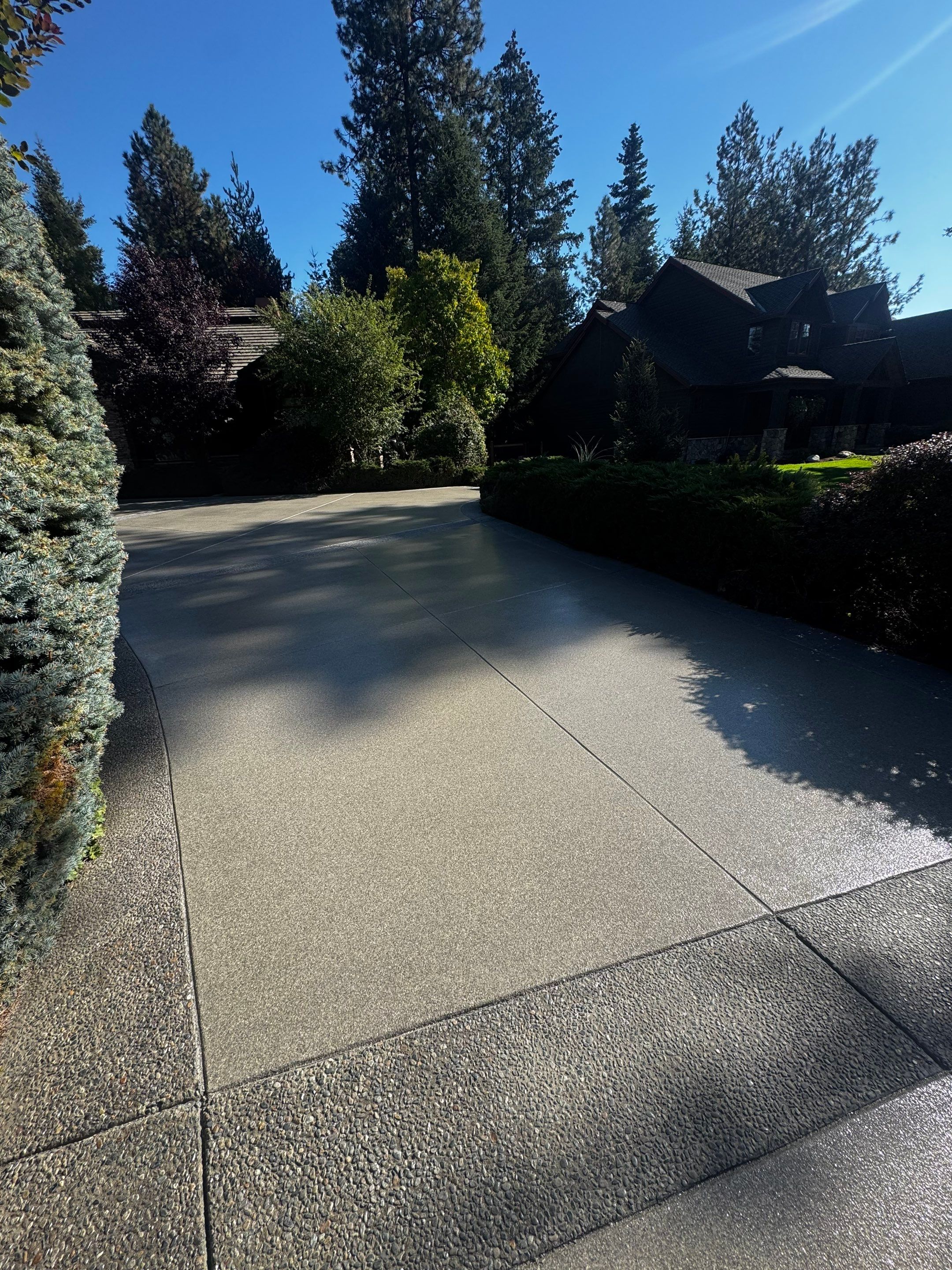 Driveway using Penntek Evolution System and Trail Mix 1/8" Chip by Croc Coatings, LLC